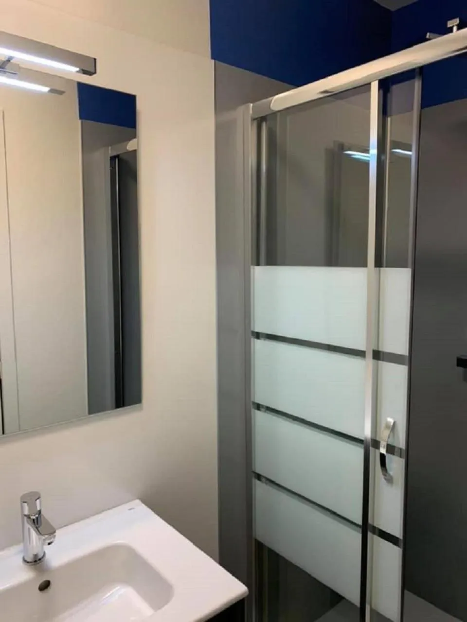 Bathroom in Logis Hôtel le Regis