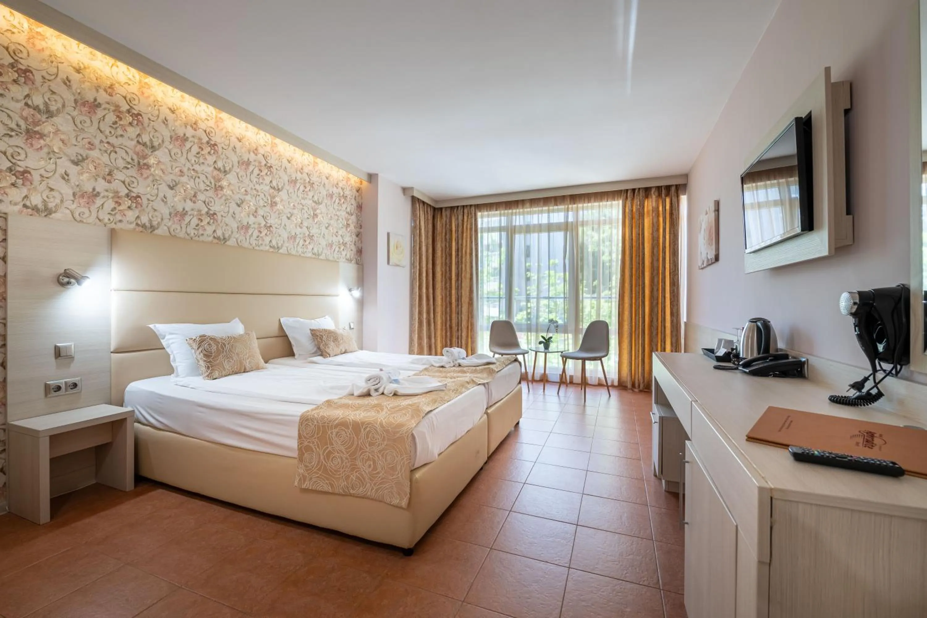 Bed in Aphrodite Beach Hotel