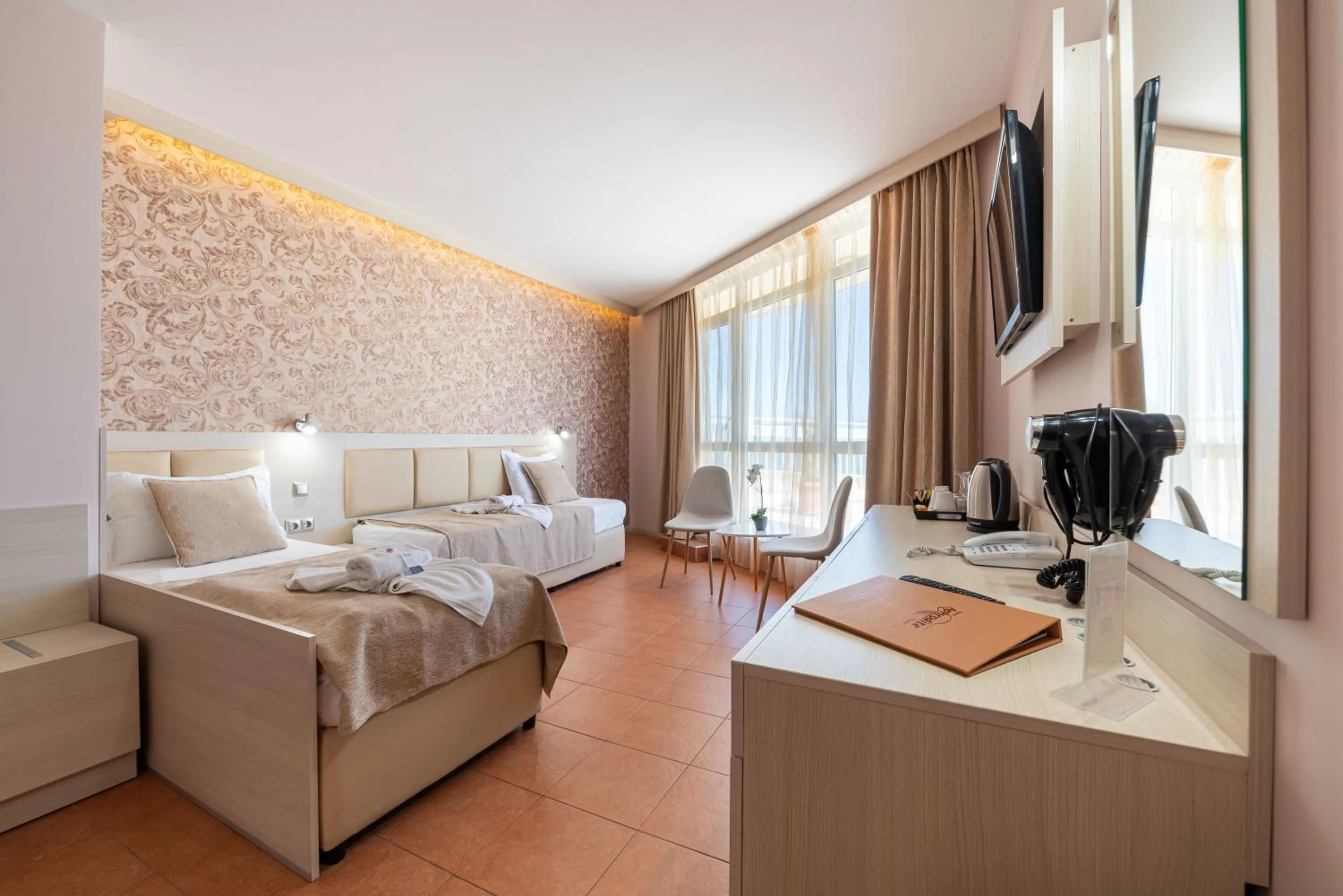 Bed in Aphrodite Beach Hotel