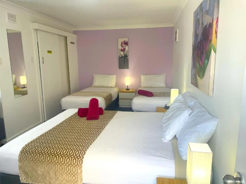 Bed in Taree Lodge Motel