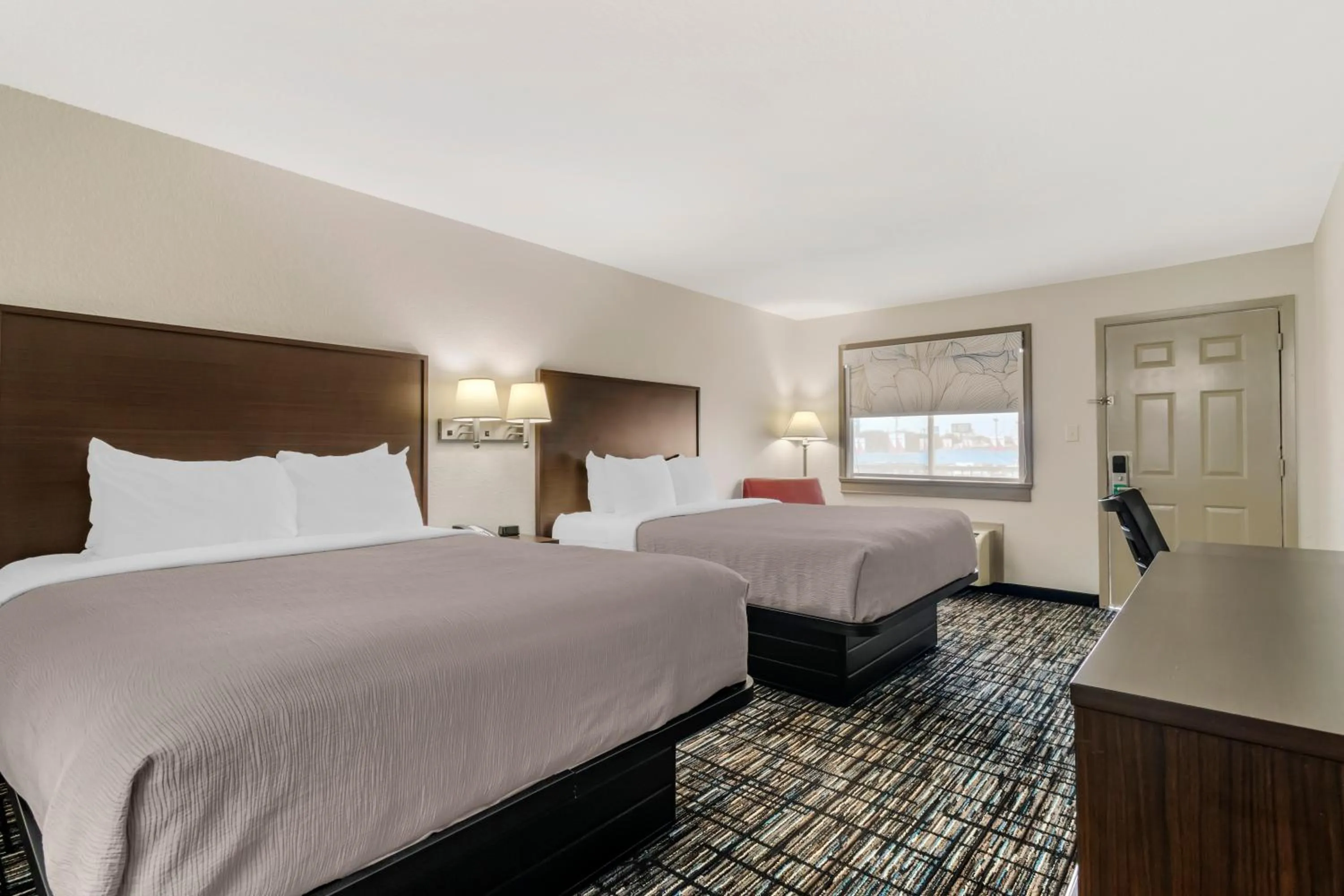 Bed in Quality Inn & Suites I-10 near Fiesta Texas