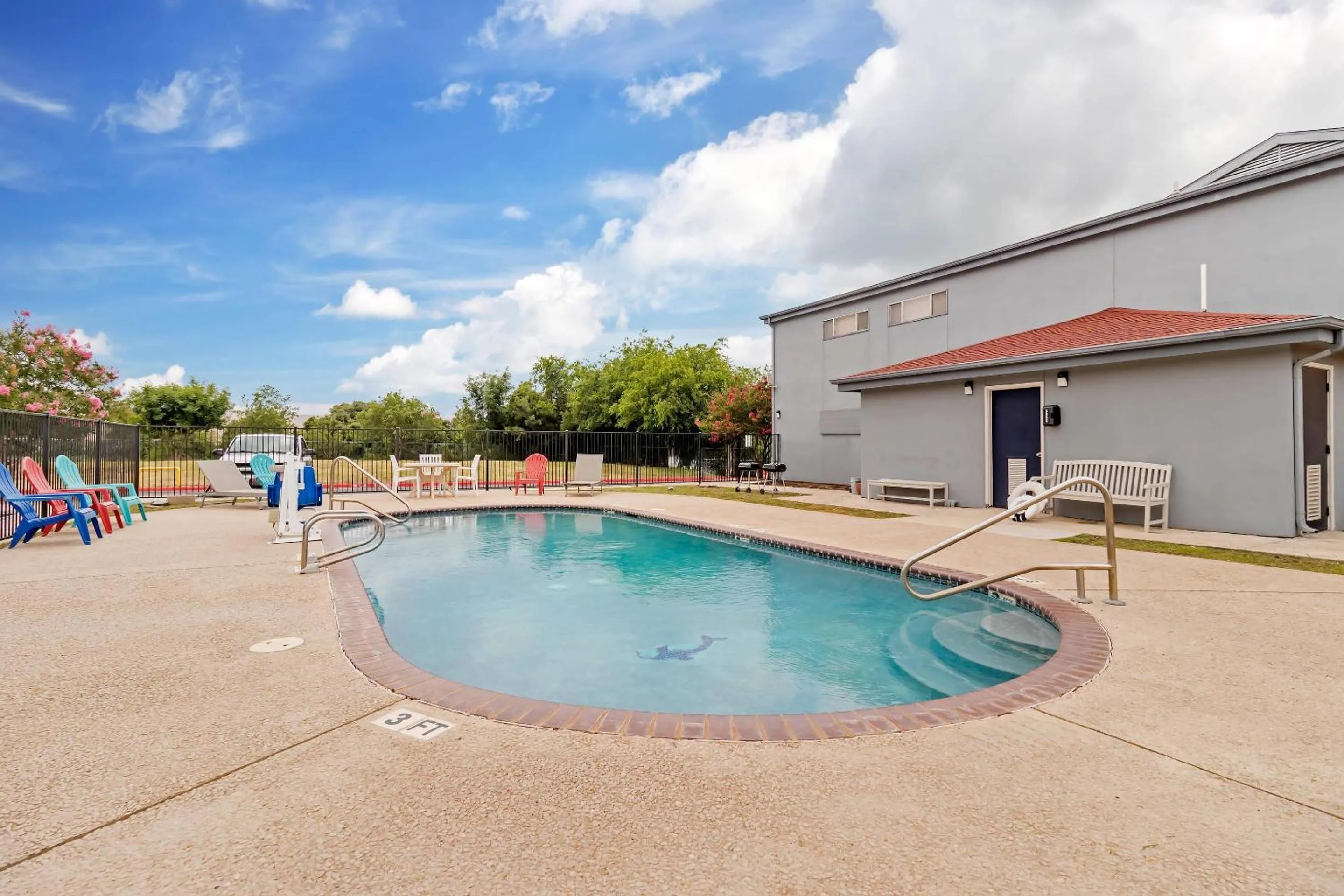 Swimming pool in Quality Inn & Suites I-10 near Fiesta Texas