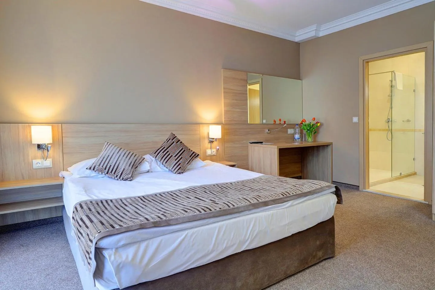 Bed in Romance Hotel and Family Suites