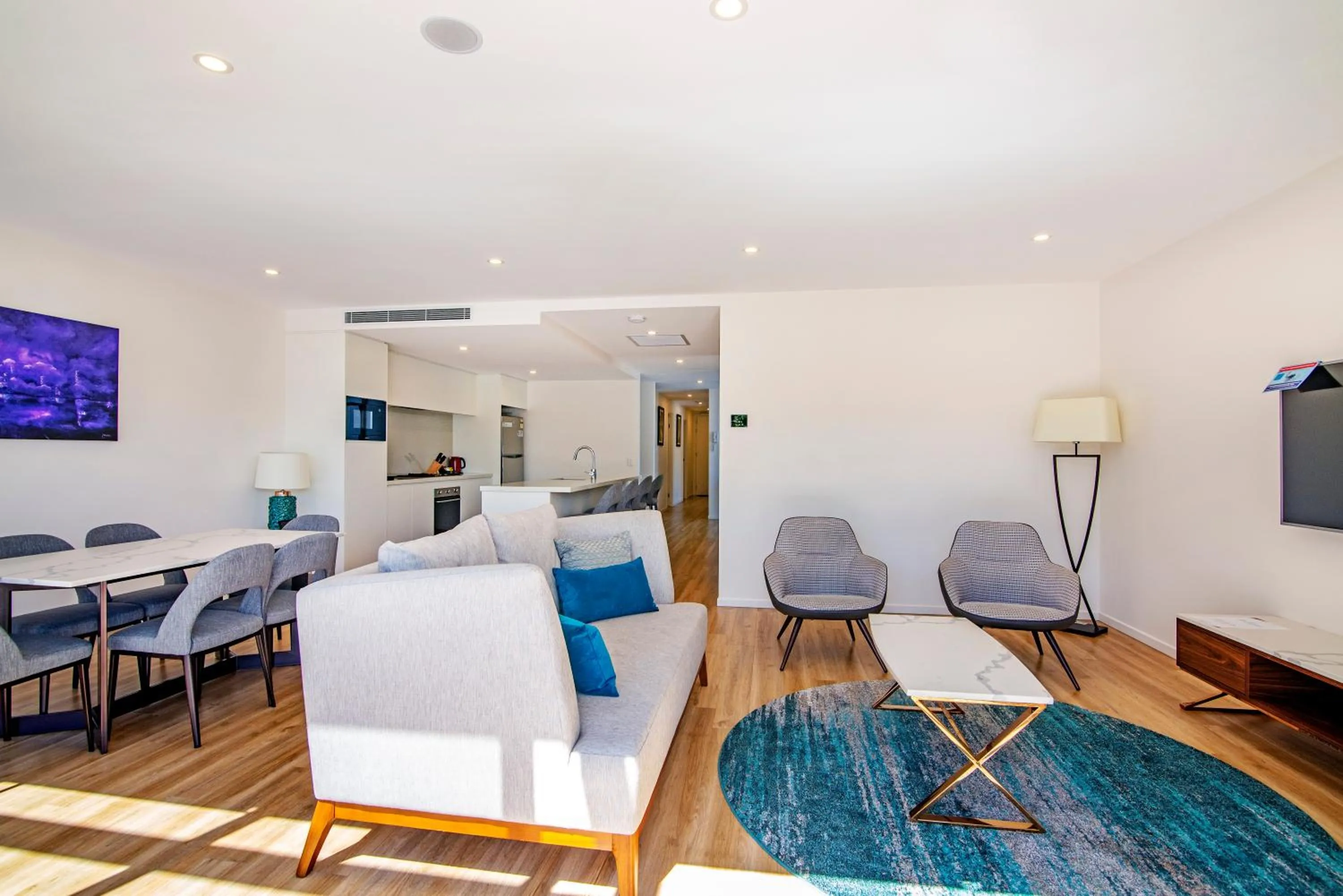 Living room in Ruby Gold Coast by CLLIX