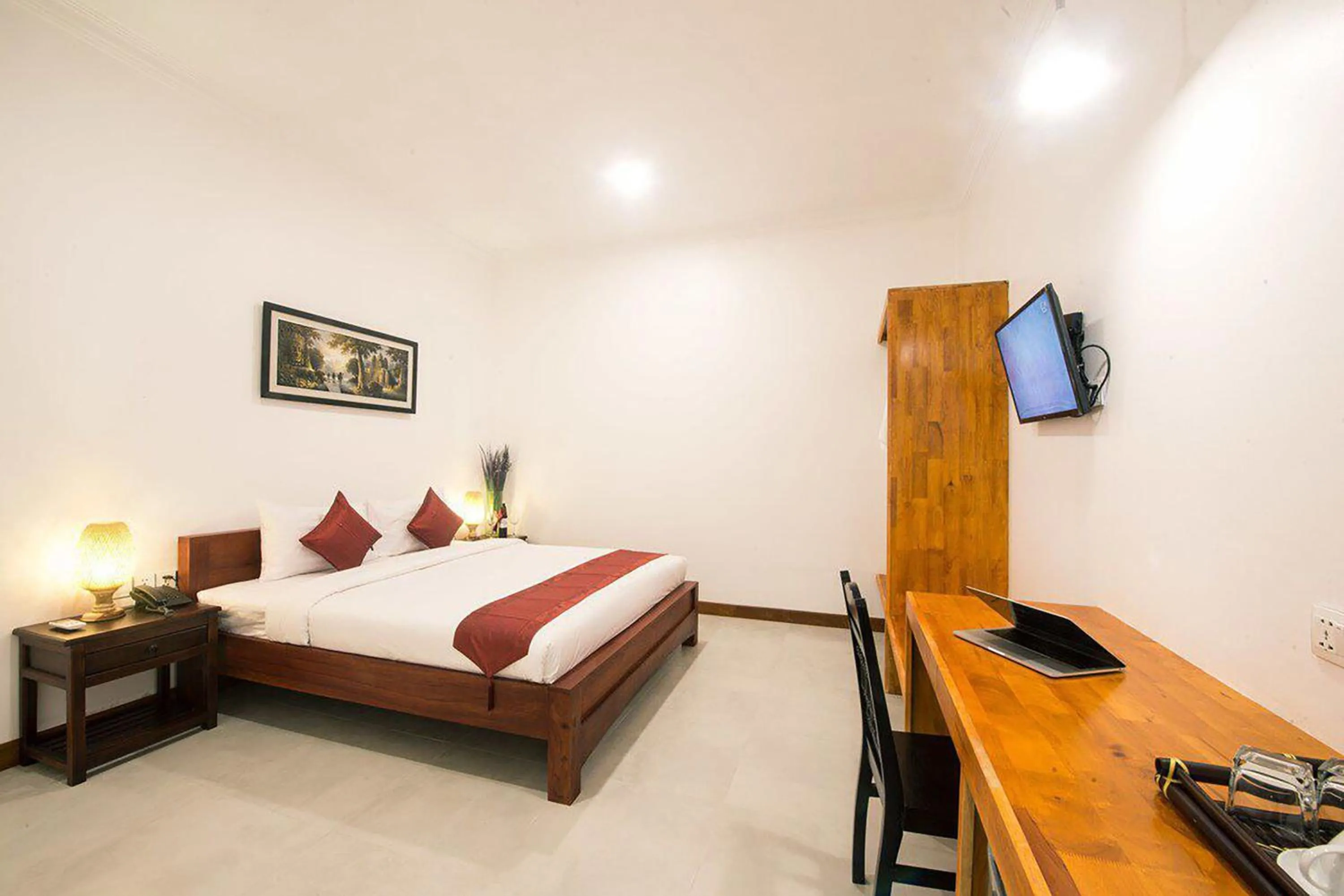 Photo of the whole room, Bed in Lavender Angkor Boutique