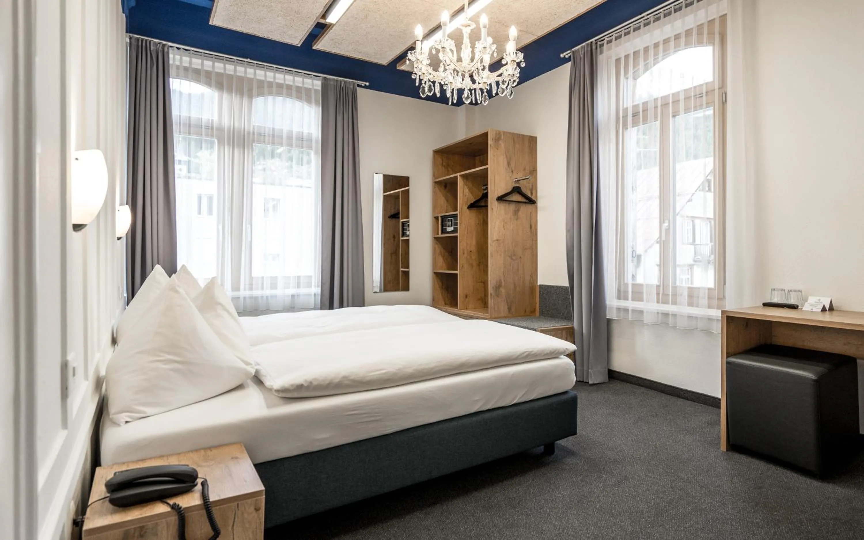 Photo of the whole room, Bed in Hotel Ochsen by Mountain Hotels