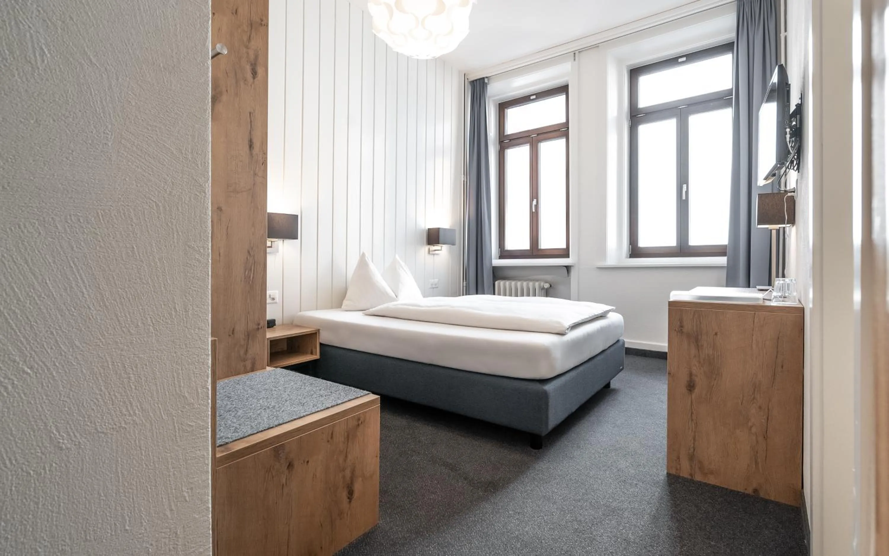 Photo of the whole room, Bed in Hotel Ochsen by Mountain Hotels