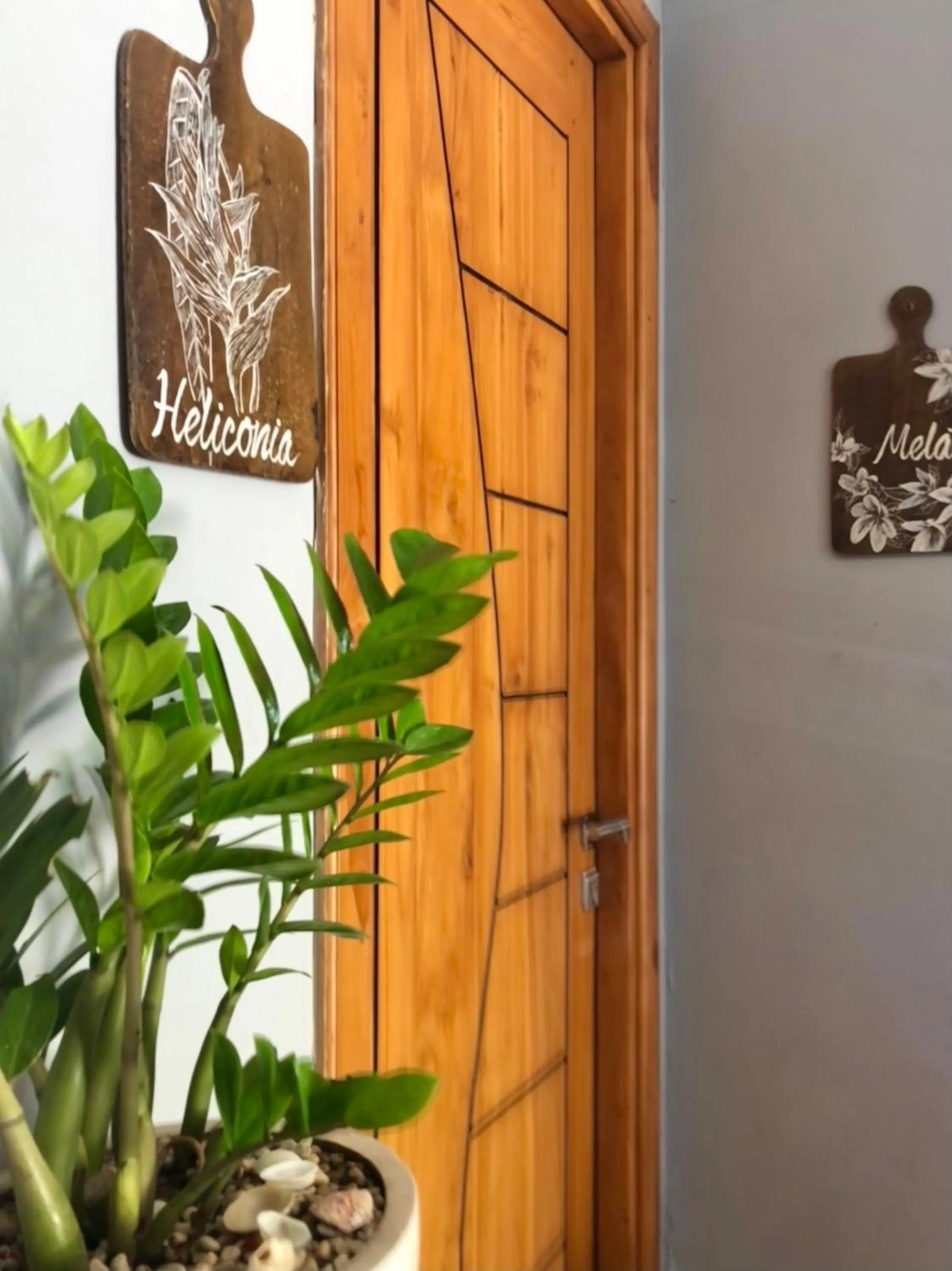 Property logo or sign in Wae Molas Hotel