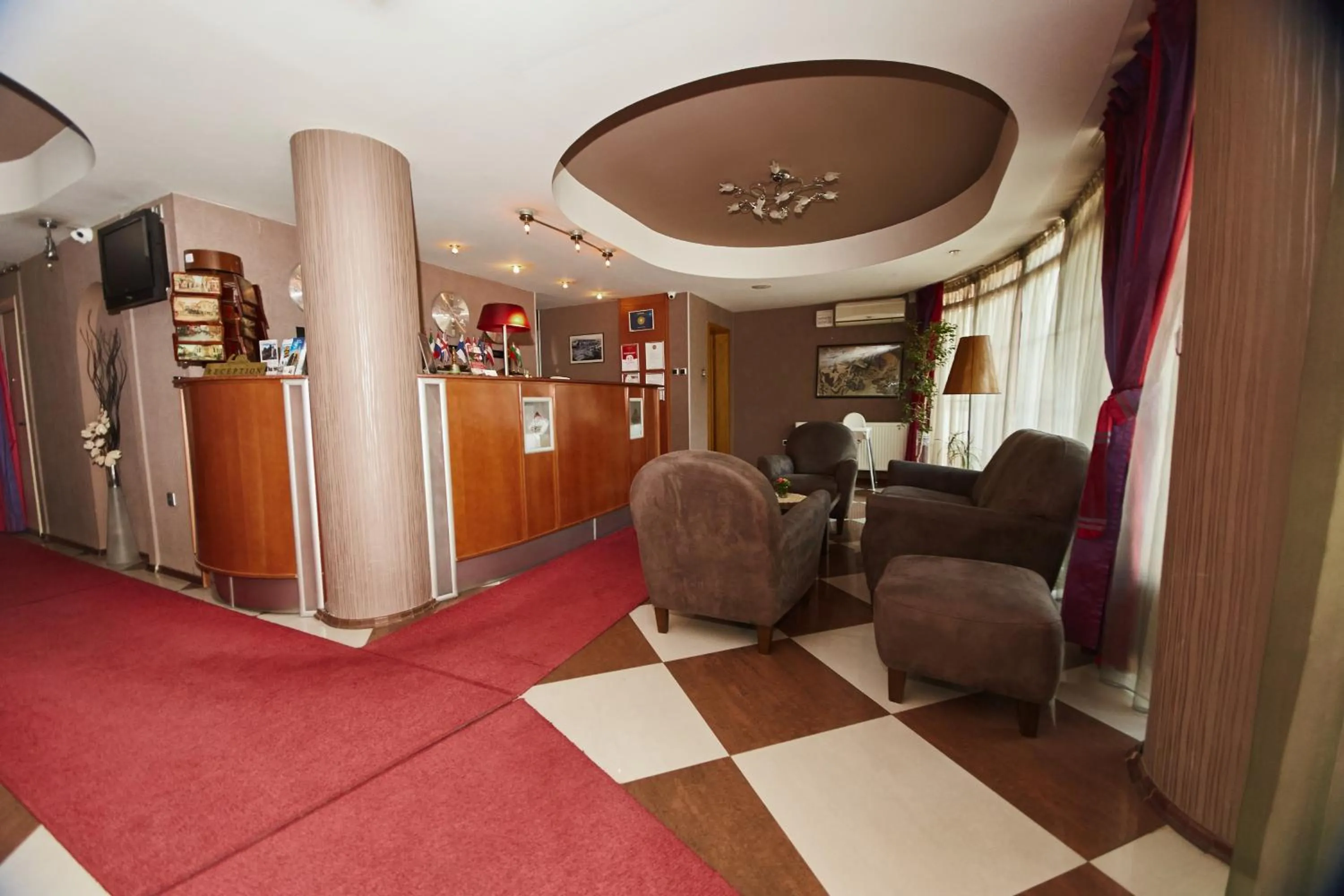 Lobby or reception in Leonardo Hotel