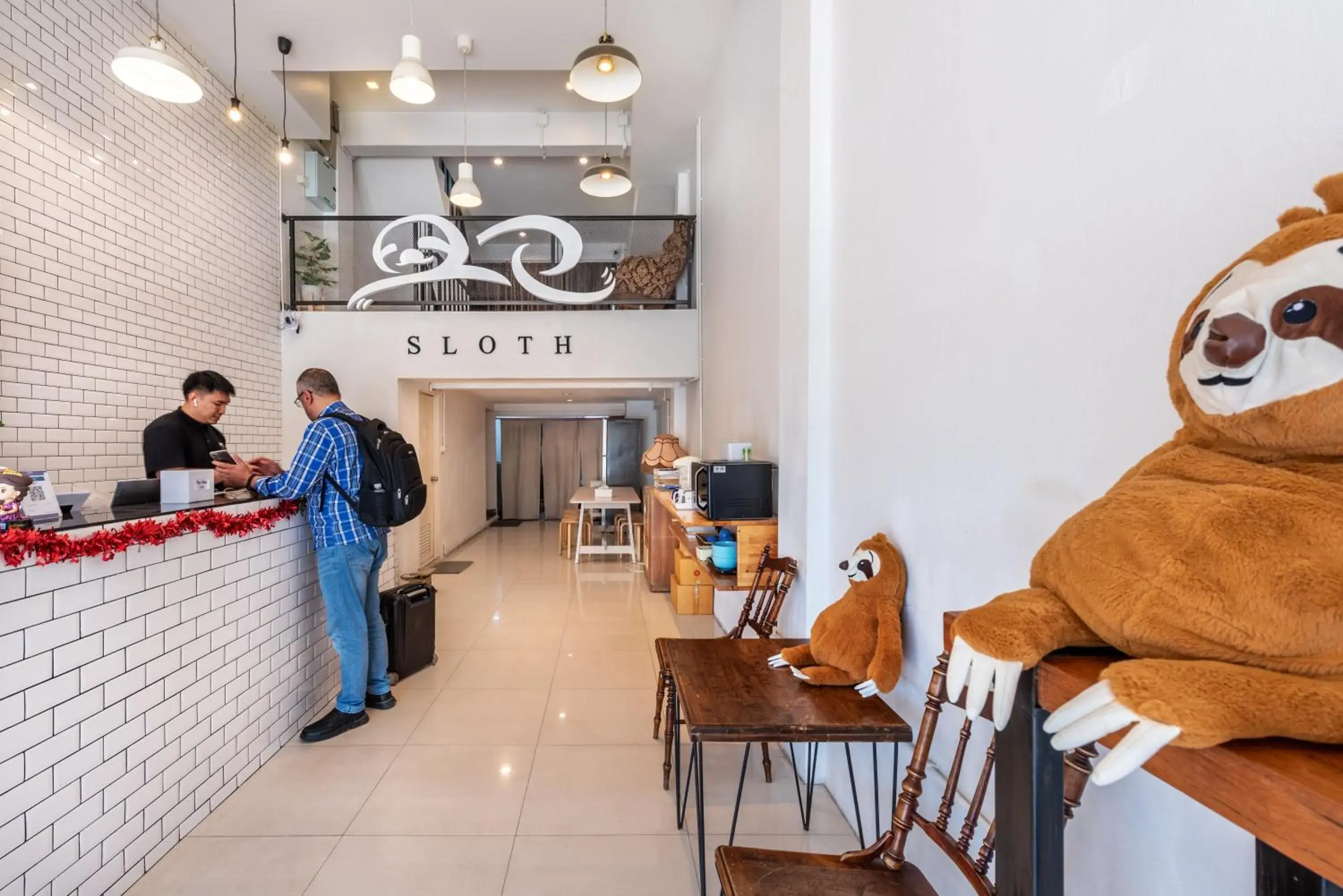 Lobby or reception in Sloth Hostel Don Mueang Lobby or reception in Sloth Hostel Don Mueang