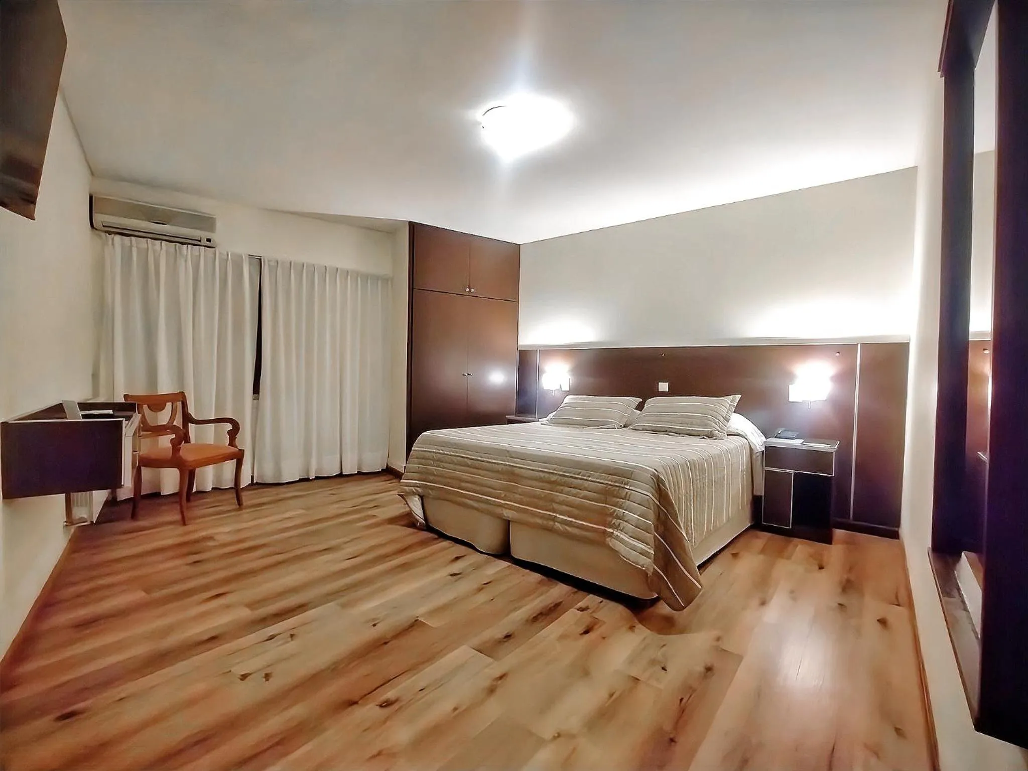 Bed in Cóndor Suites Apart Hotel