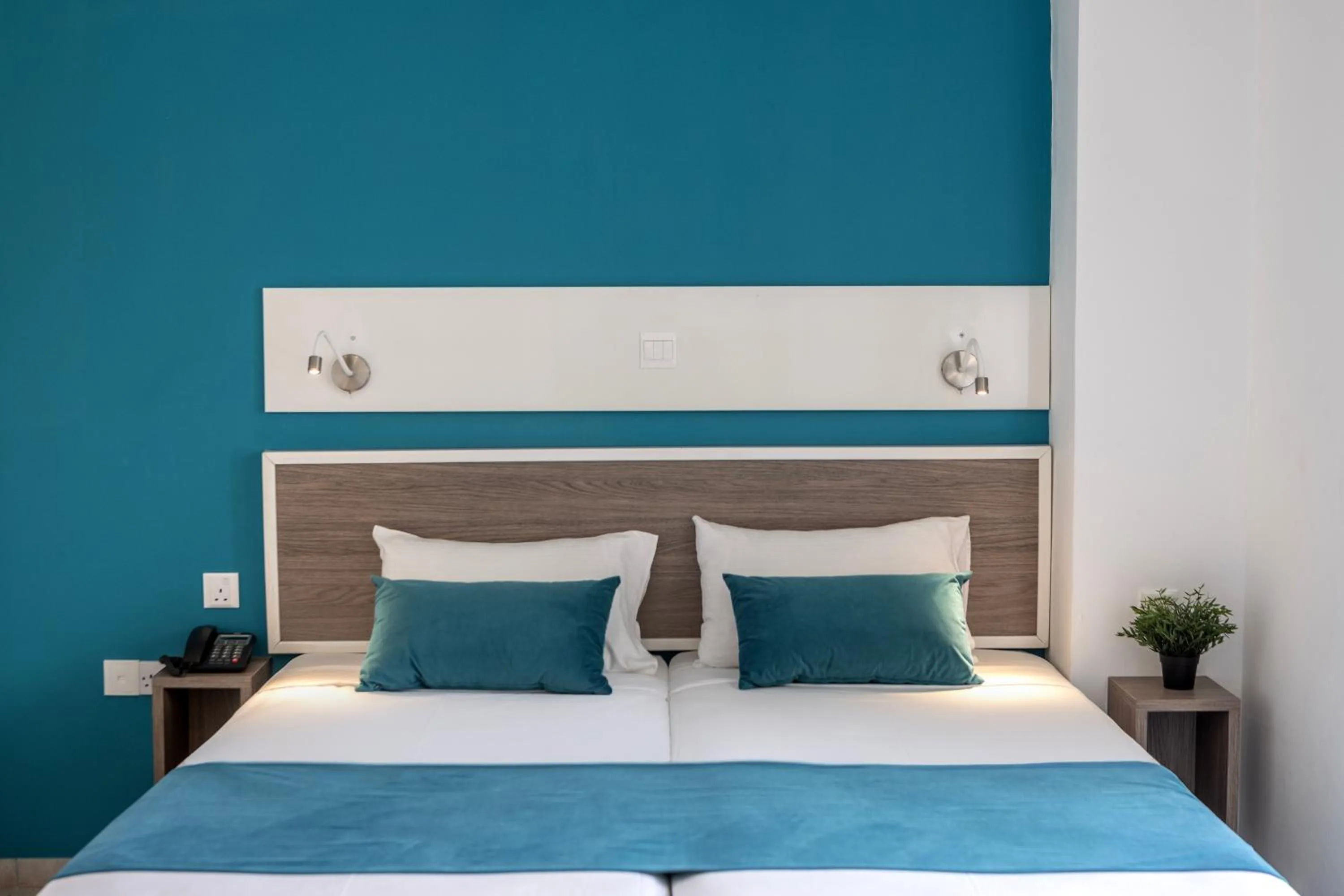 Bed in Lantiana Gardens ApartHotel