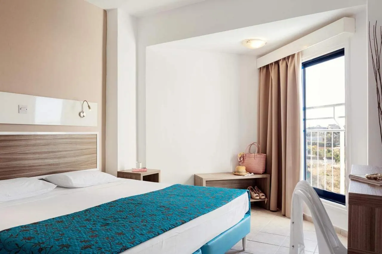 Bedroom in Lantiana Gardens ApartHotel