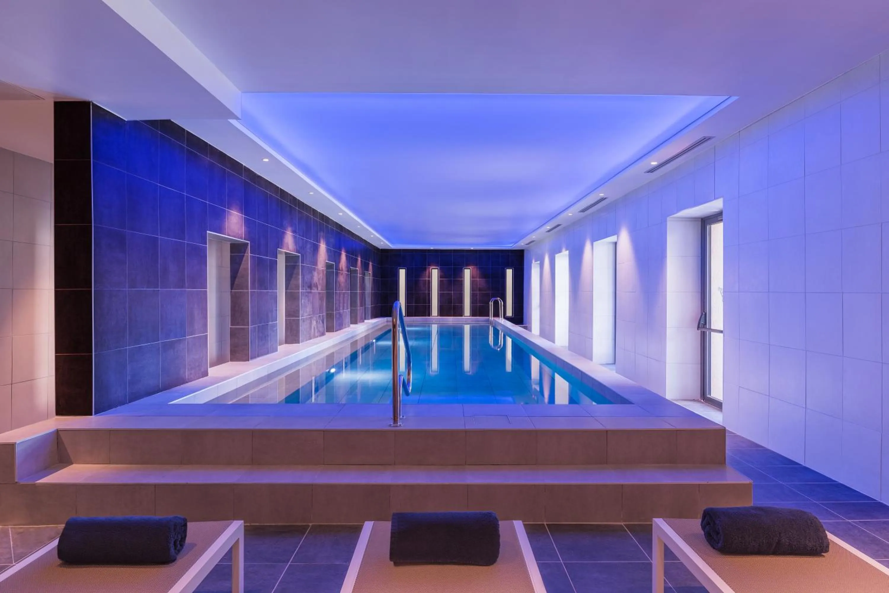 Swimming pool in Hotel du Roi & Spa by SOWELL COLLECTION