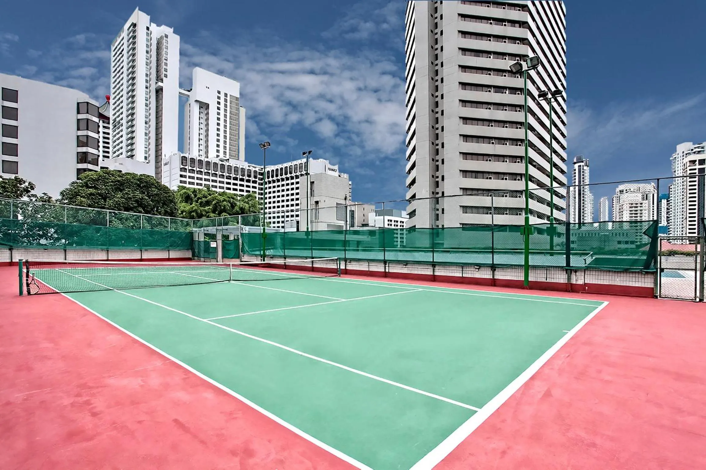Tennis court in Far East Plaza Residences by Far East Hospitality