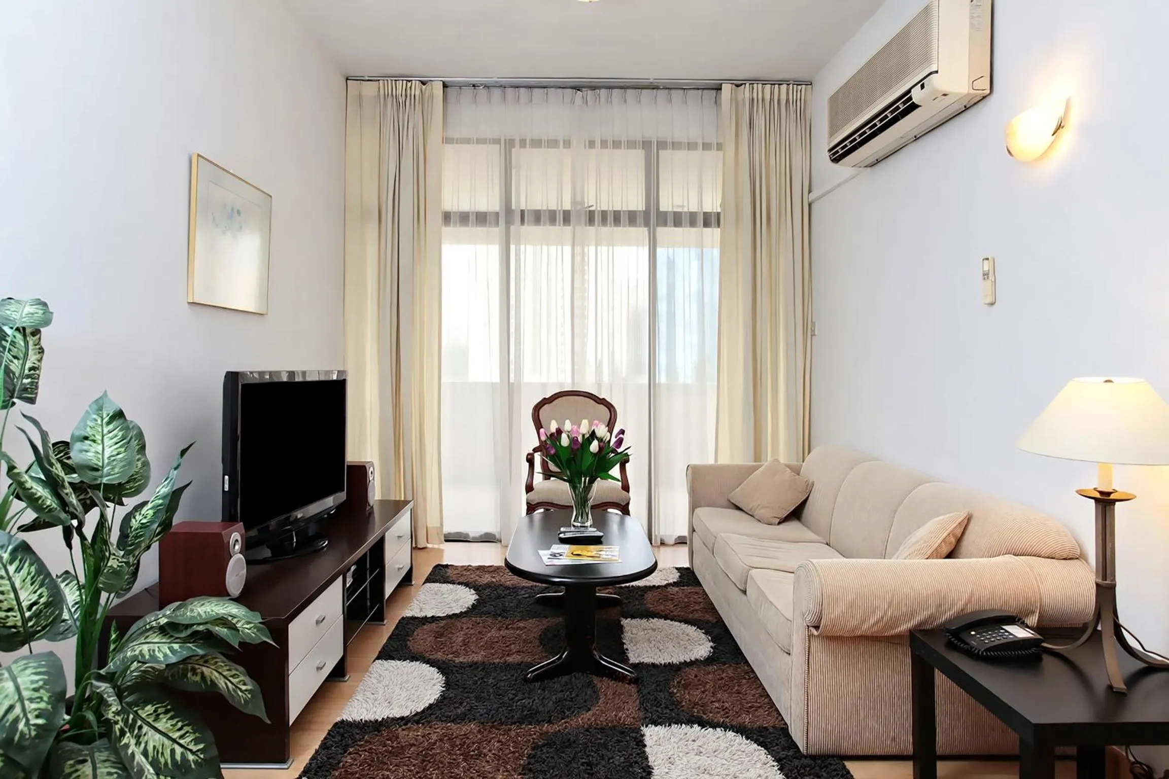Living room in Far East Plaza Residences by Far East Hospitality