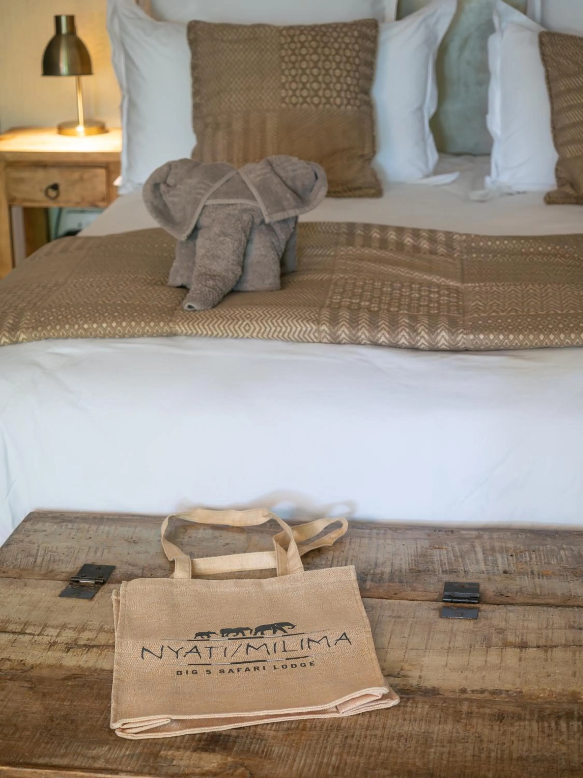 Bed in Nyati Safari Lodge