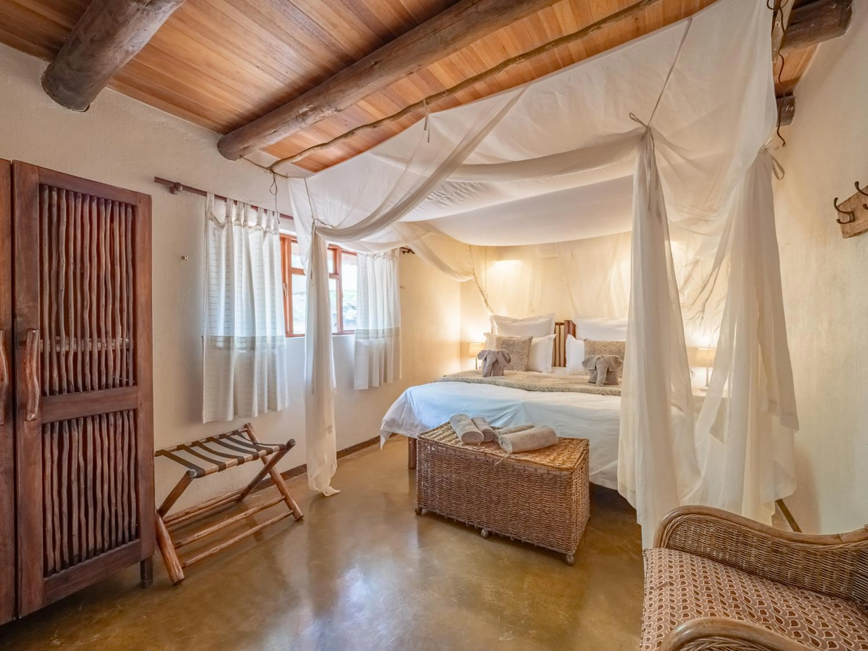 Bed in Nyati Safari Lodge