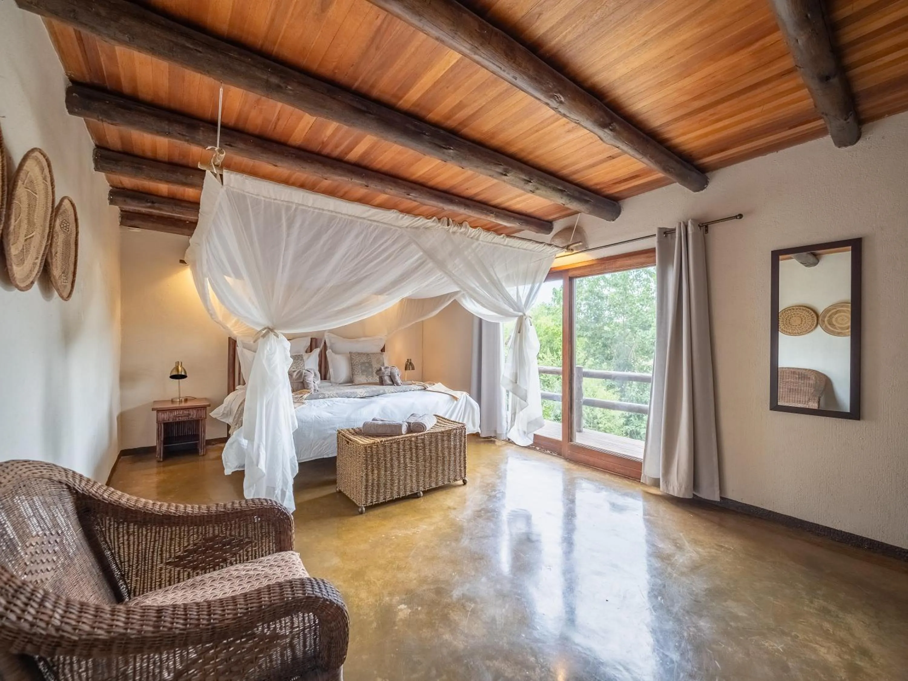 Bed in Nyati Safari Lodge