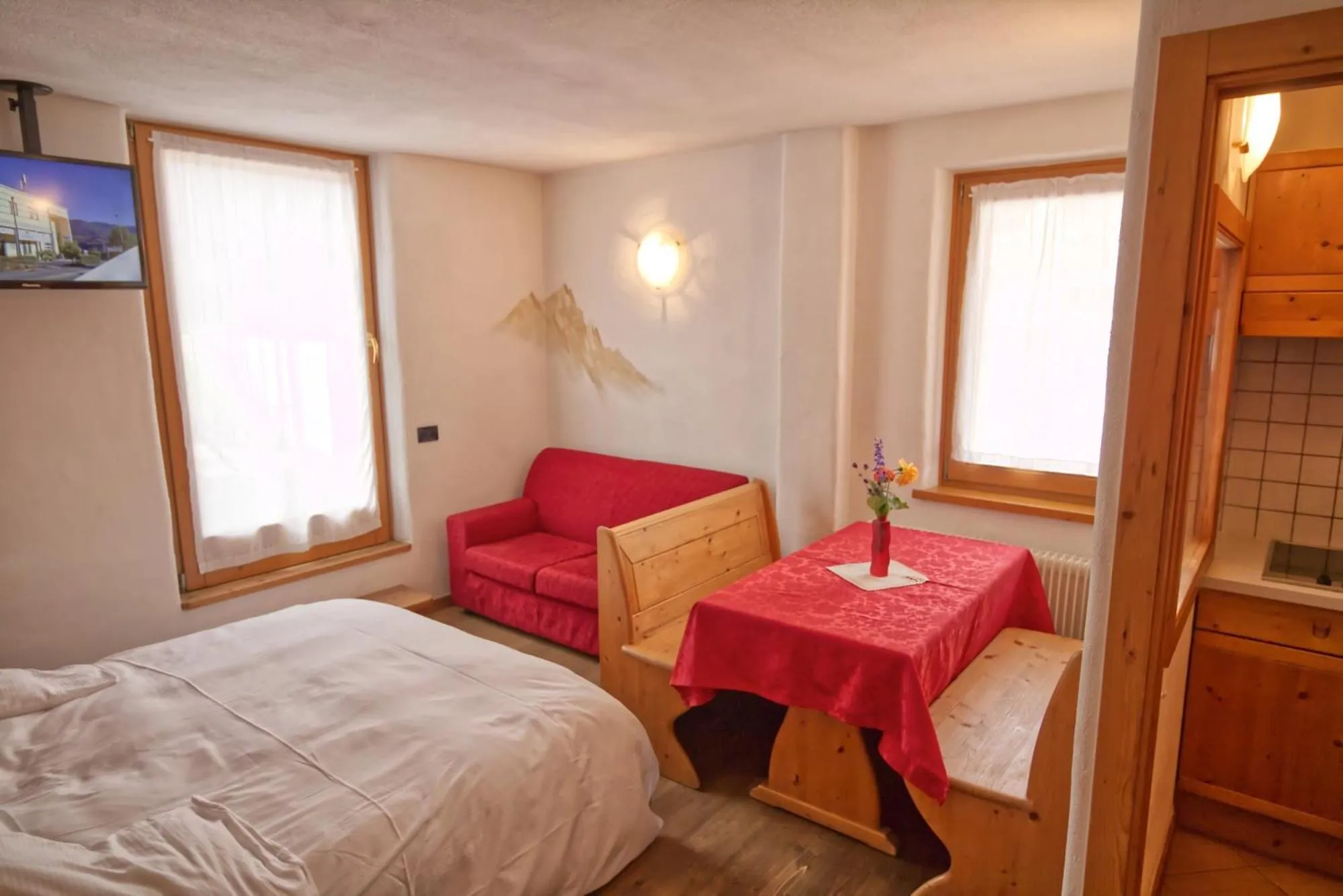 Living room, Bed in Residence Miramonti