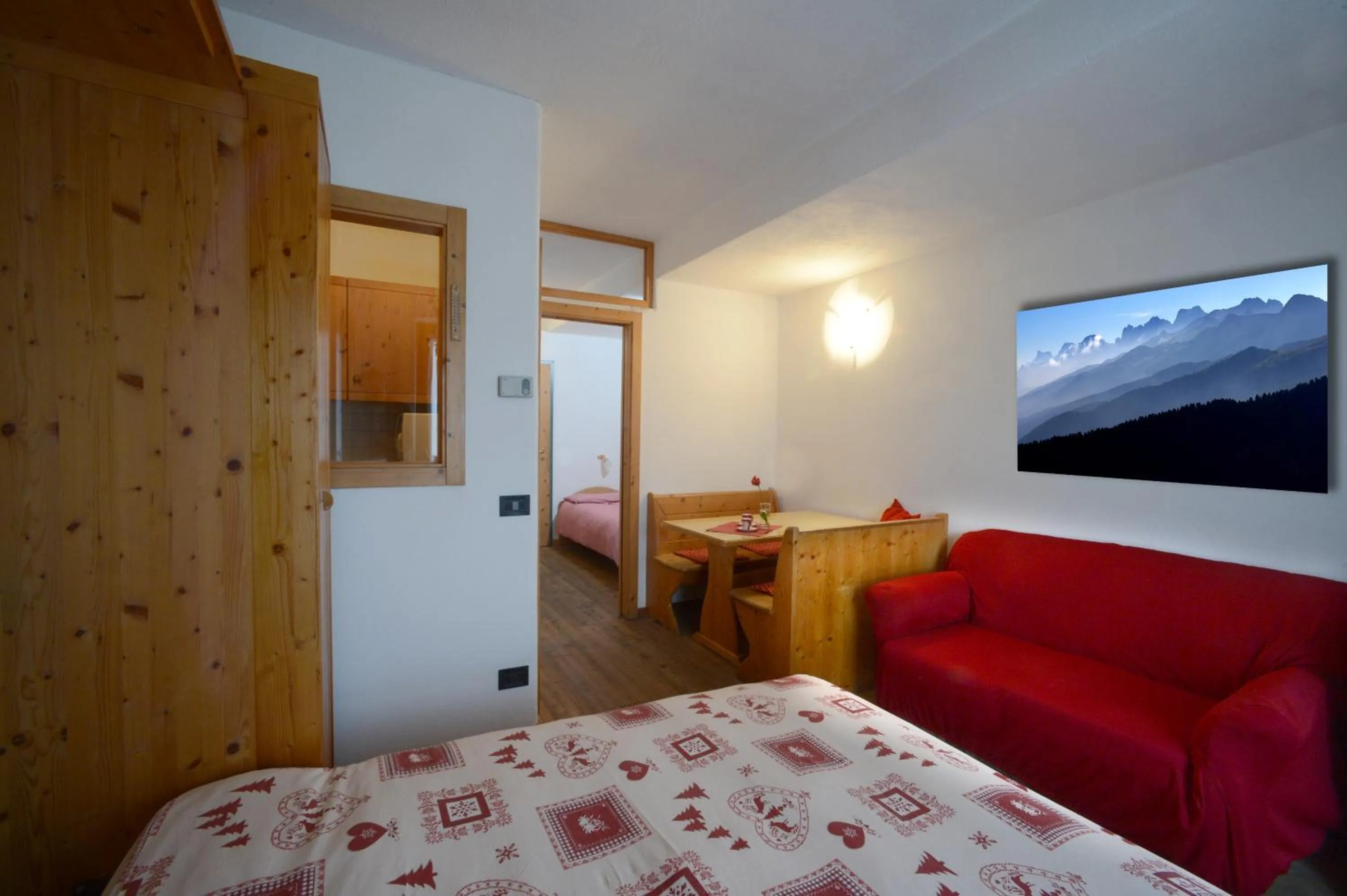 Photo of the whole room, Bed in Residence Miramonti