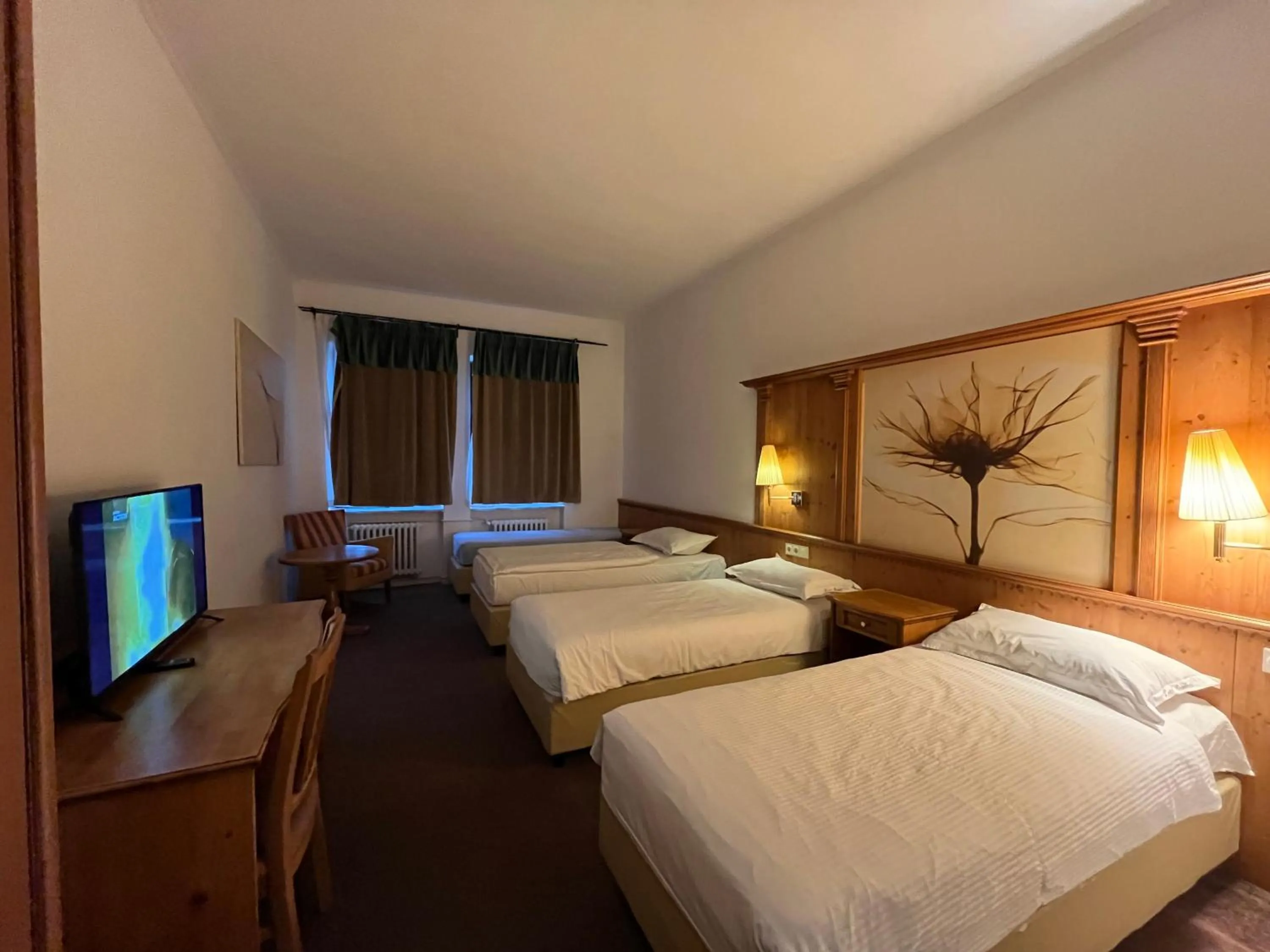 Seating area, Bed in Hotel Braník