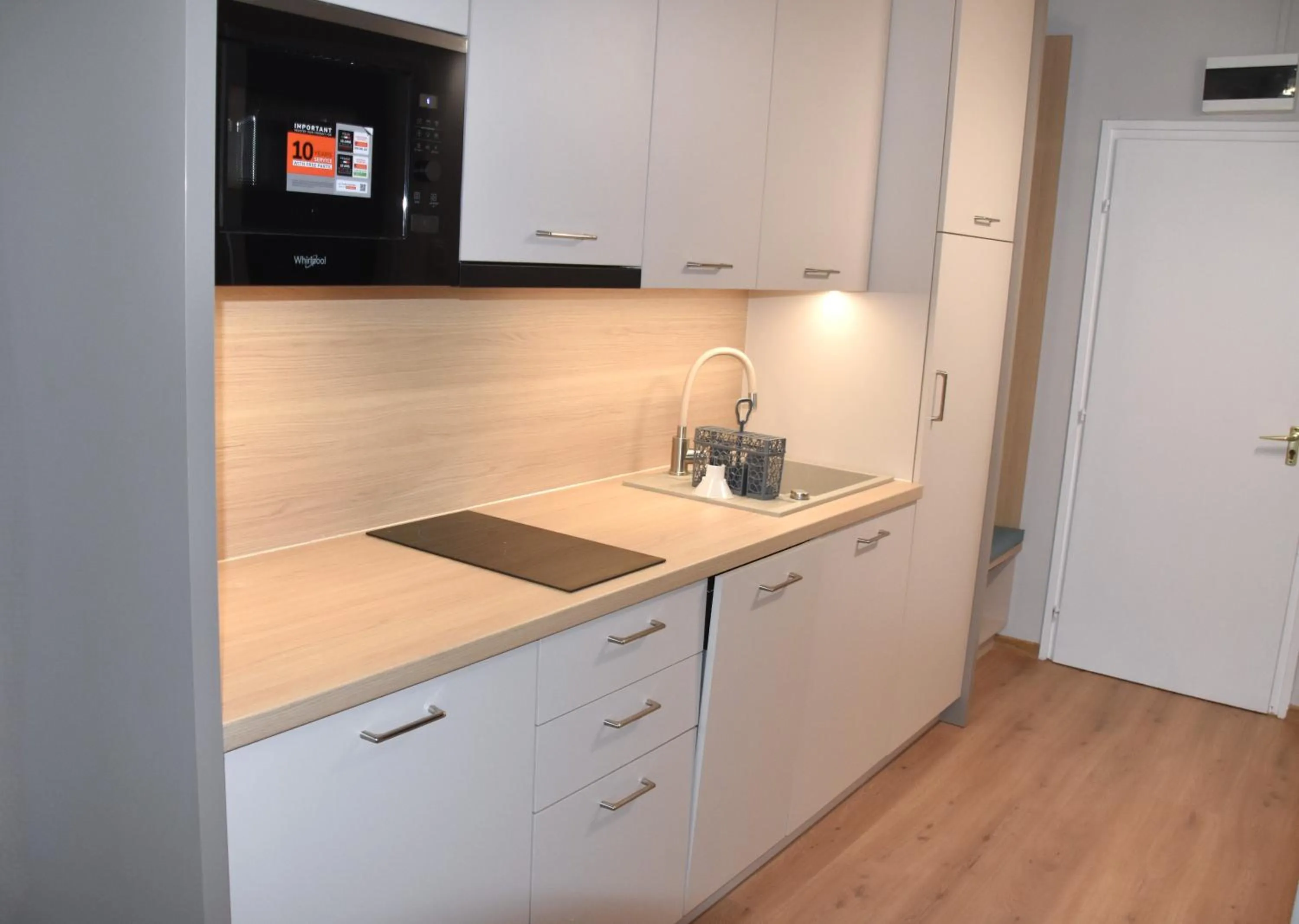 Kitchen or kitchenette in Hőforrás Hotel