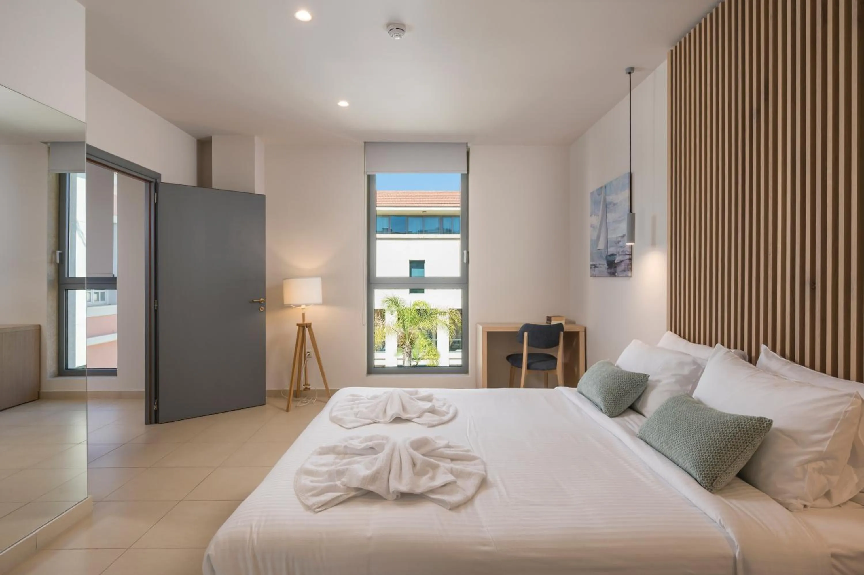 Bed in Trianon Luxury Apartments & Suites