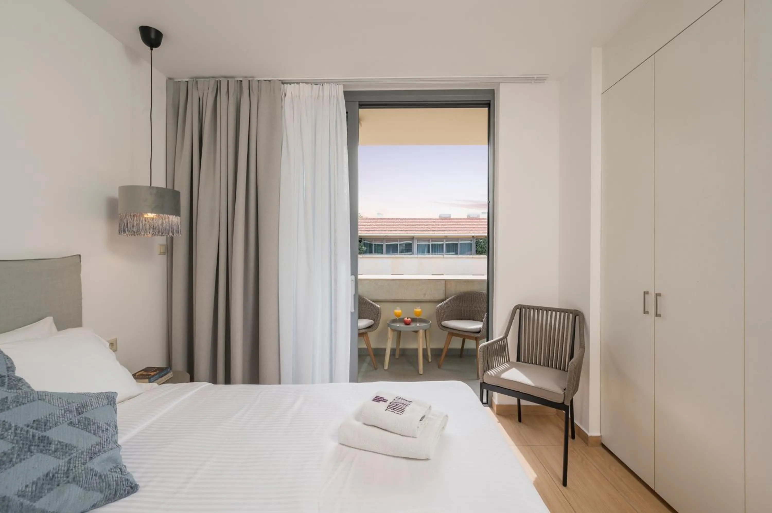 Bed in Trianon Luxury Apartments & Suites