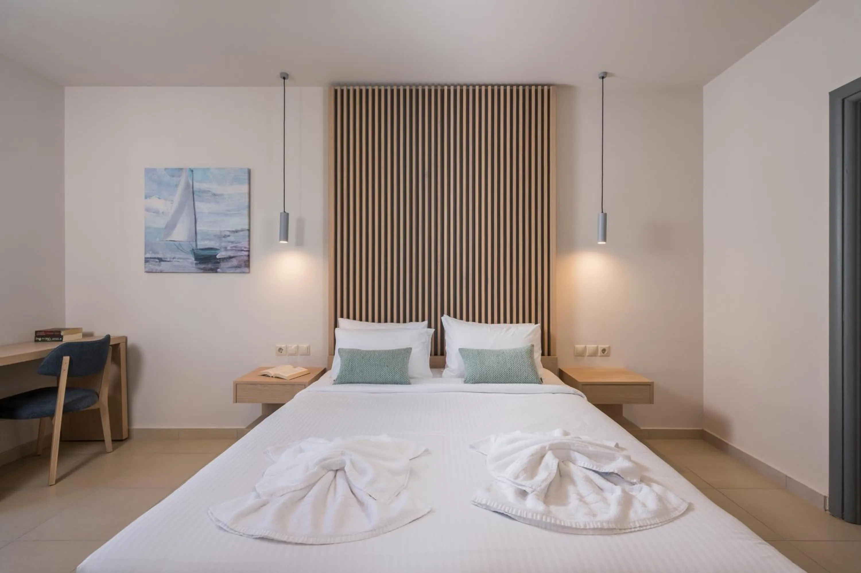 Bed in Trianon Luxury Apartments & Suites