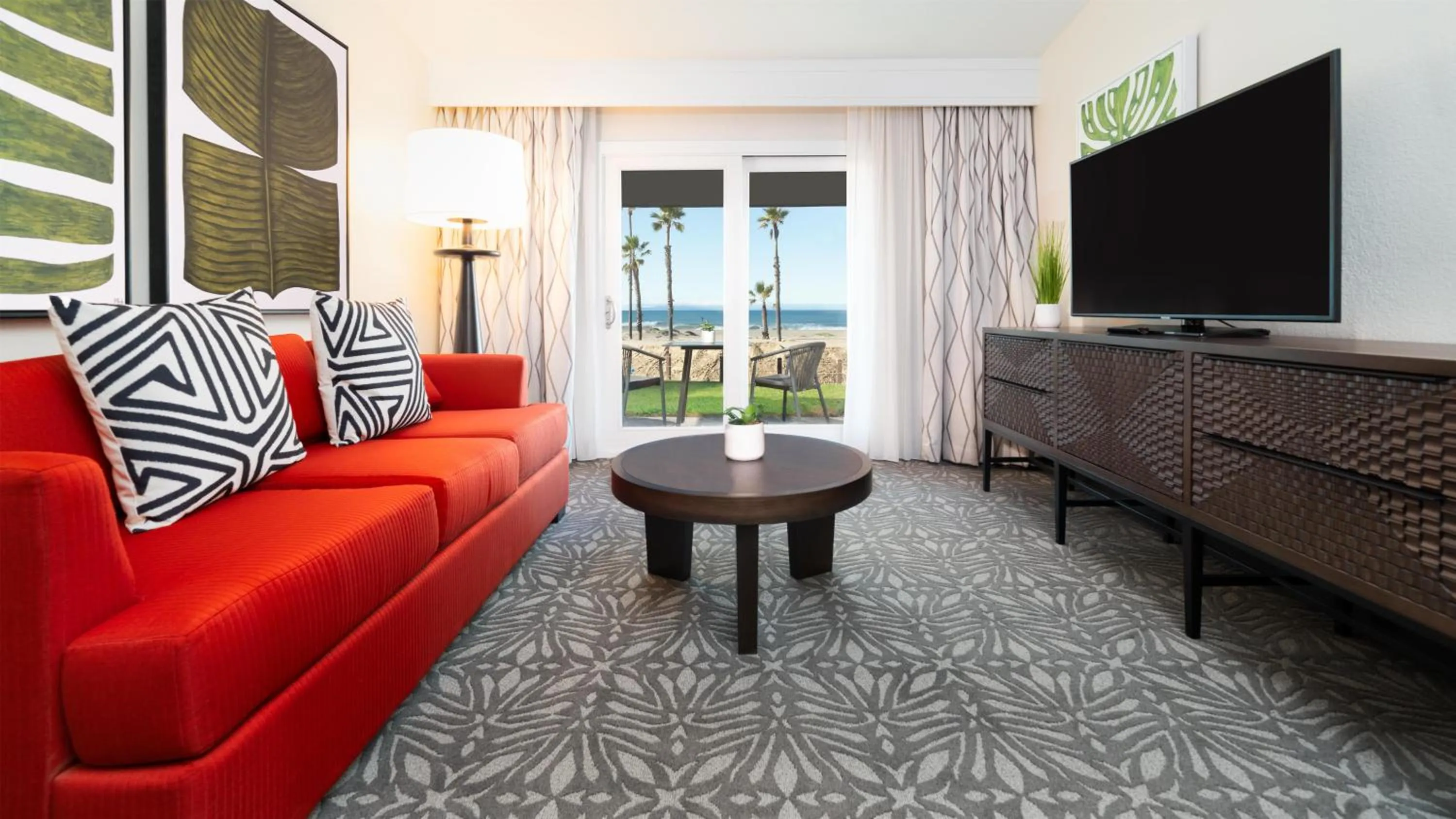 Living room in Zachari Dunes on Mandalay Beach, Curio Collection by Hilton