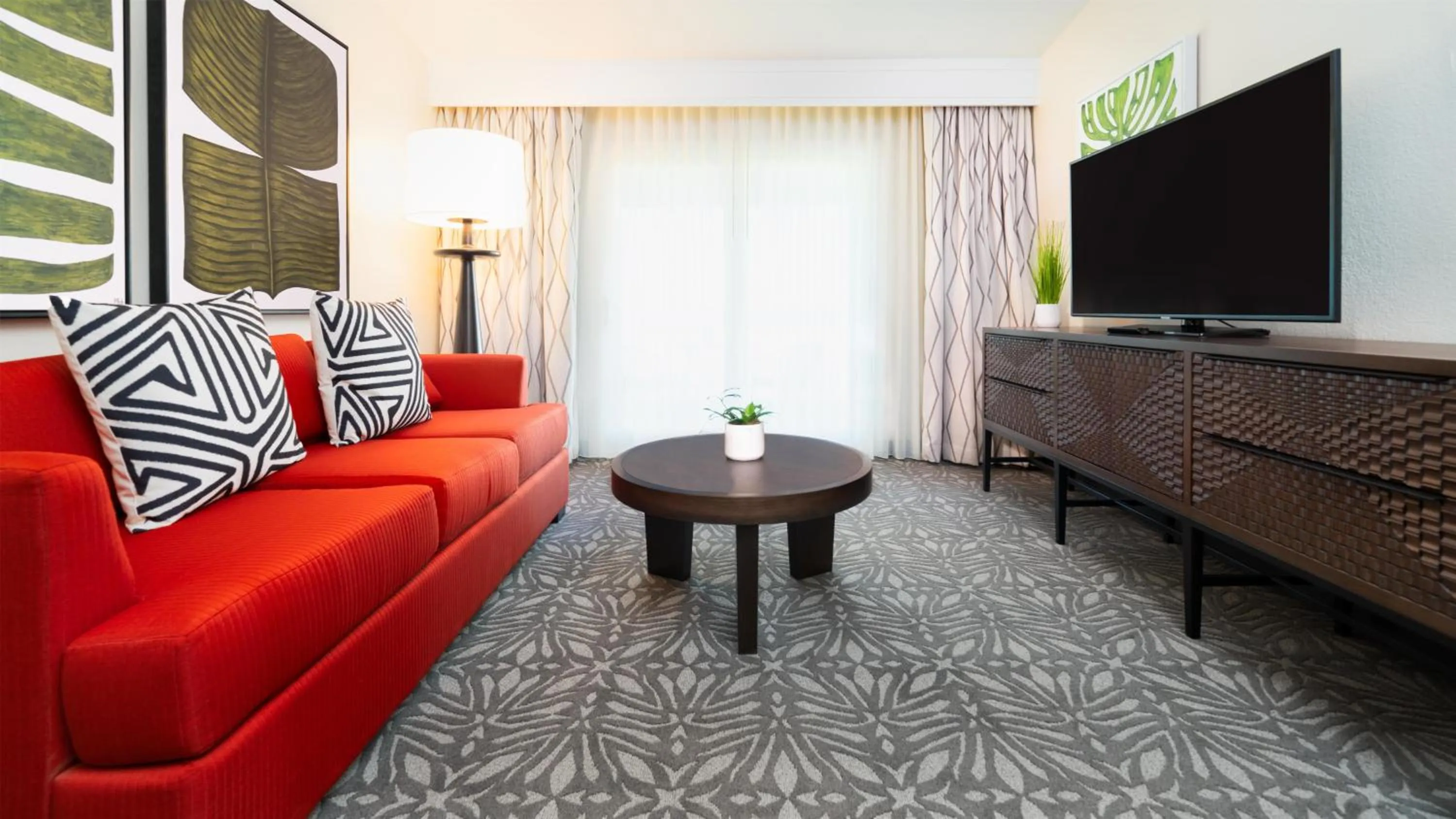 Living room in Zachari Dunes on Mandalay Beach, Curio Collection by Hilton