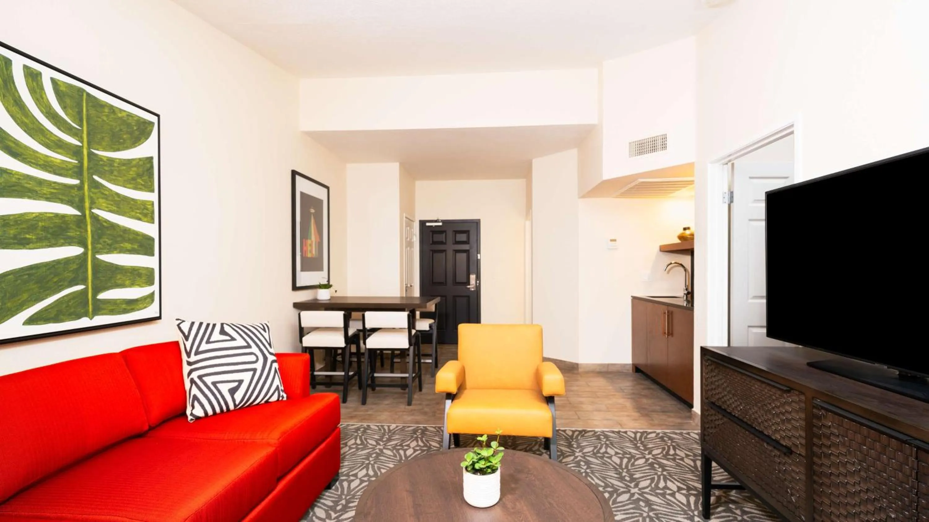 Living room in Zachari Dunes on Mandalay Beach, Curio Collection by Hilton