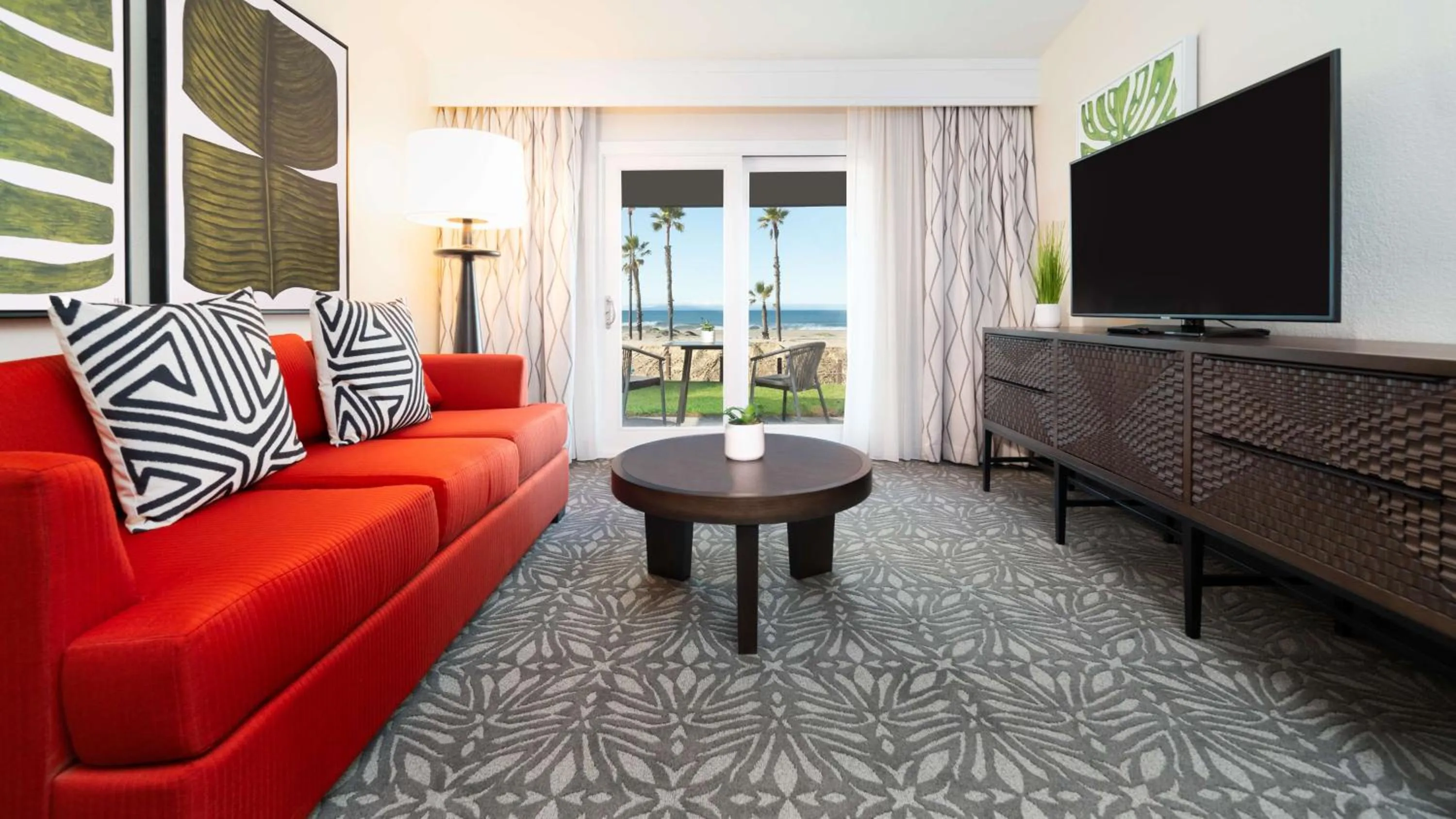 Living room in Zachari Dunes on Mandalay Beach, Curio Collection by Hilton