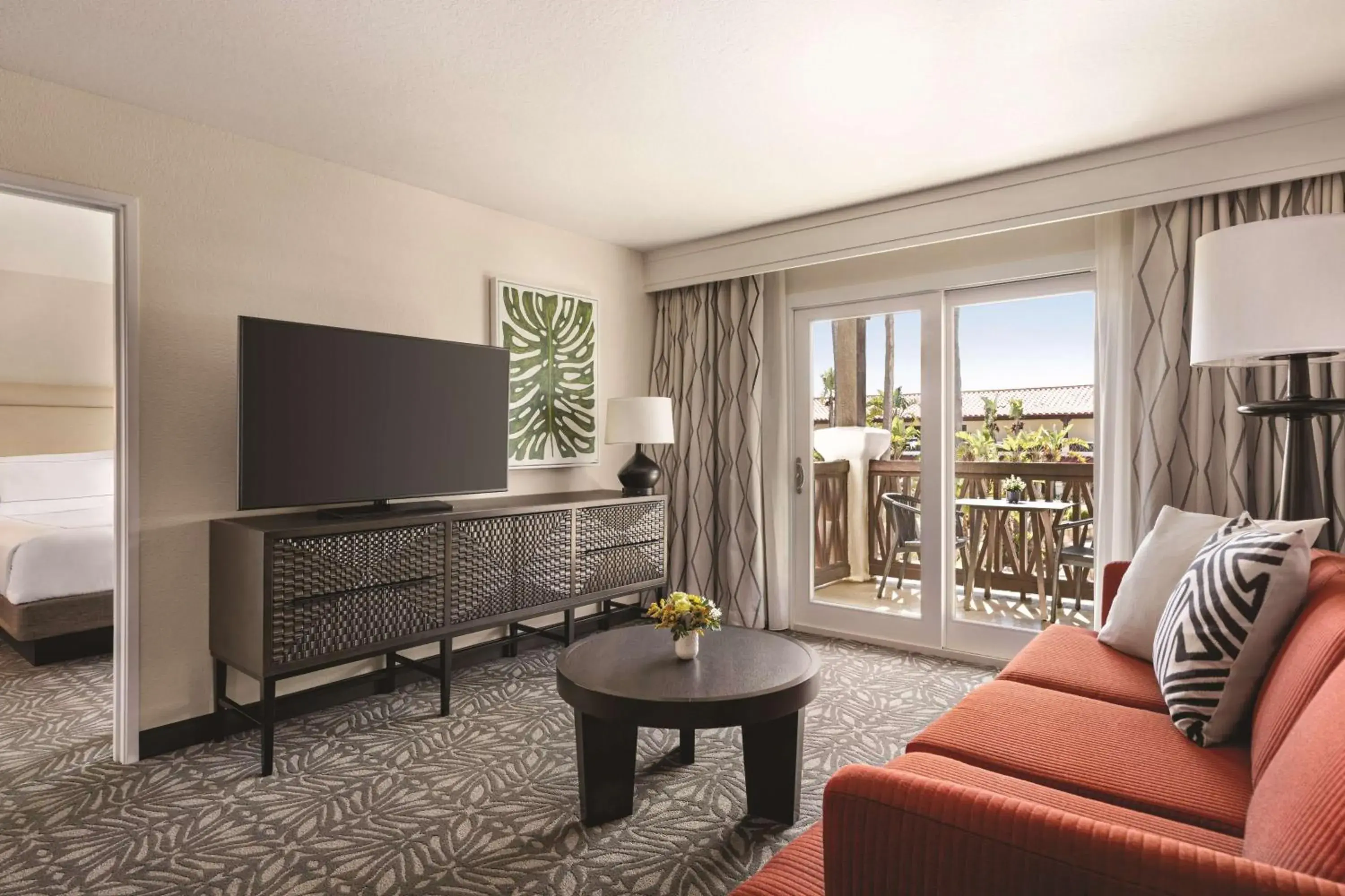 Living room in Zachari Dunes on Mandalay Beach, Curio Collection by Hilton Living room in Zachari Dunes on Mandalay Beach, Curio Collection by Hilton