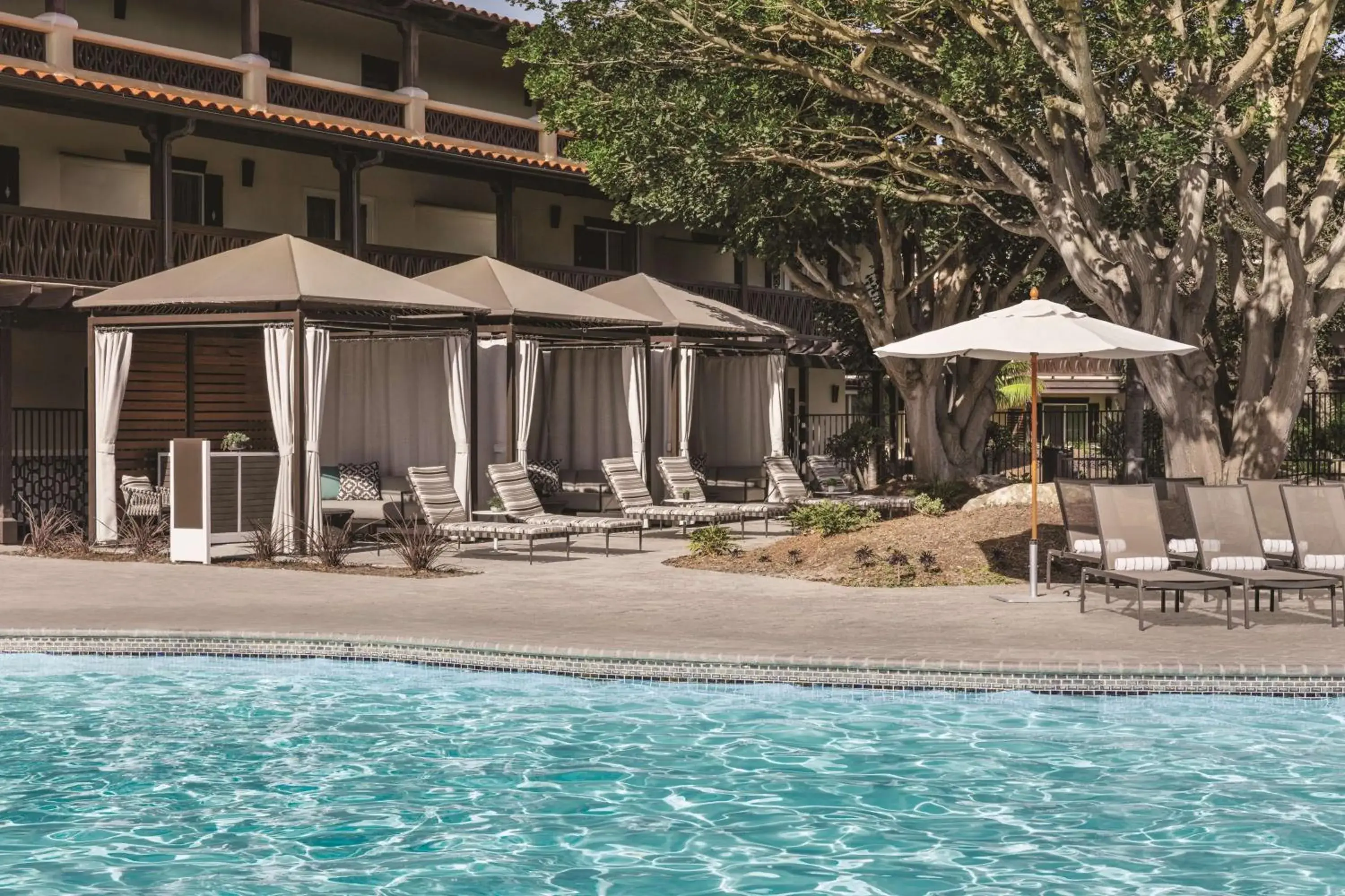 Pool view in Zachari Dunes on Mandalay Beach, Curio Collection by Hilton Pool view in Zachari Dunes on Mandalay Beach, Curio Collection by Hilton