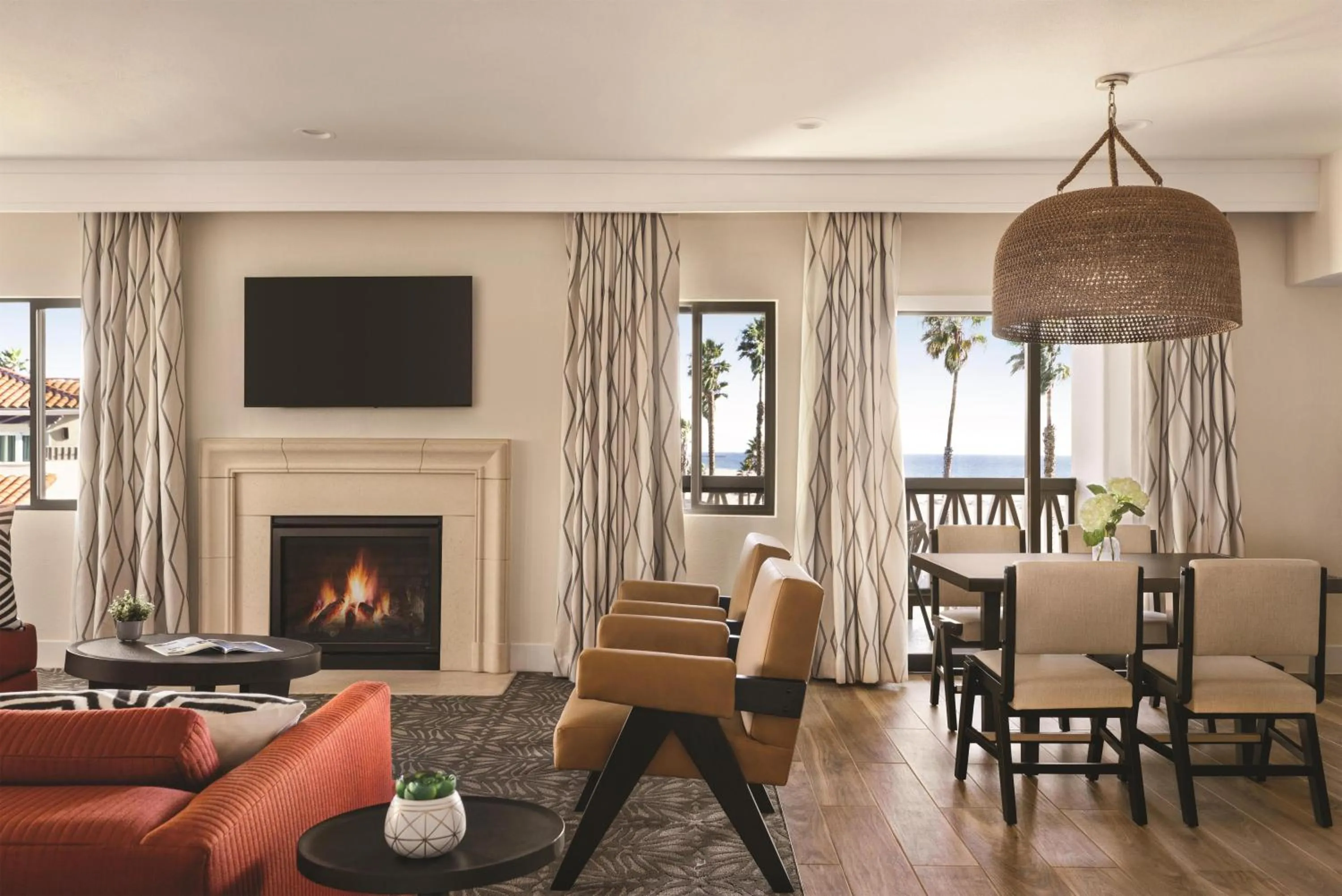 Living room in Zachari Dunes on Mandalay Beach, Curio Collection by Hilton