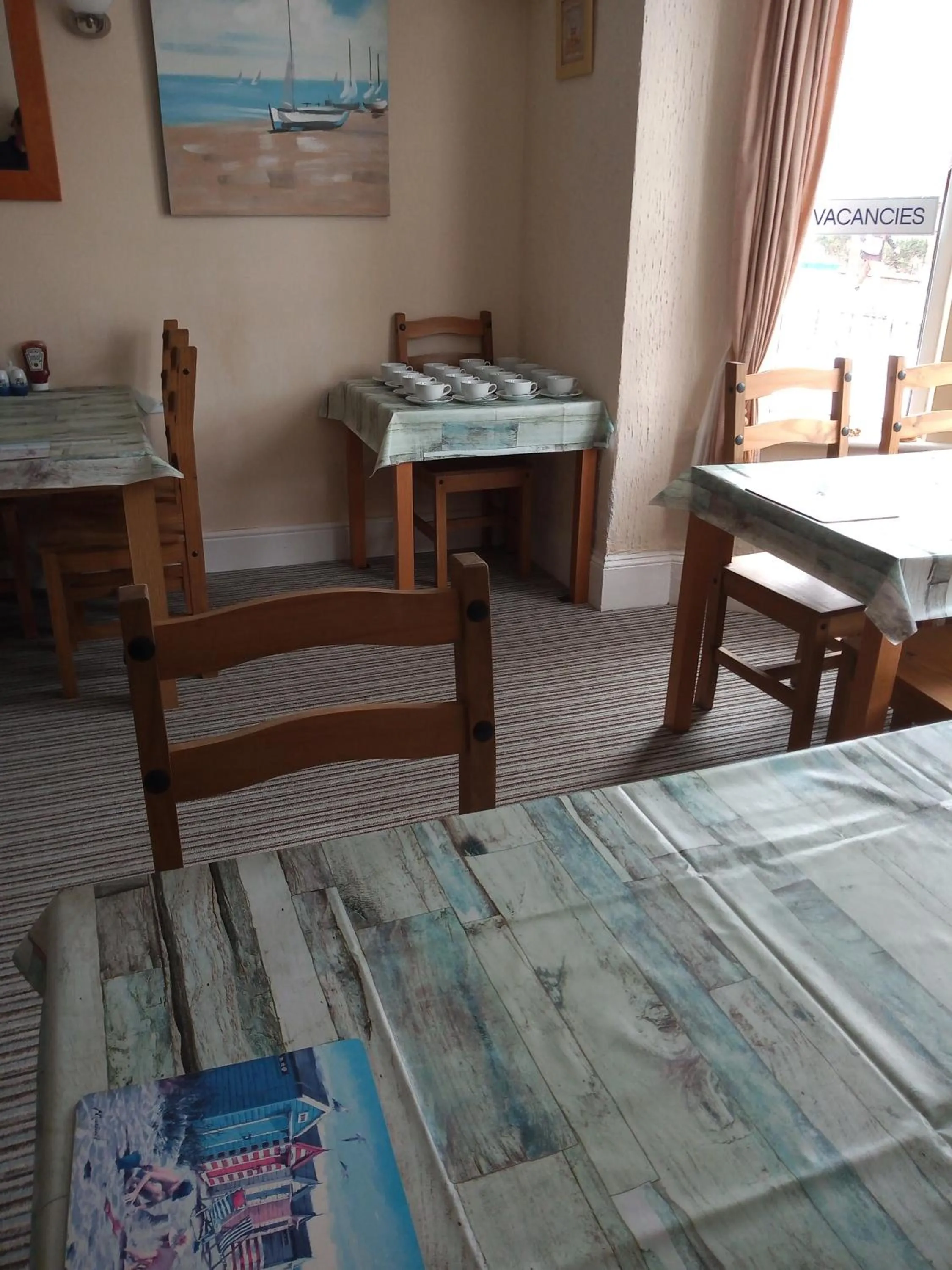 Dining area, Bed in Sandcastles Guest House