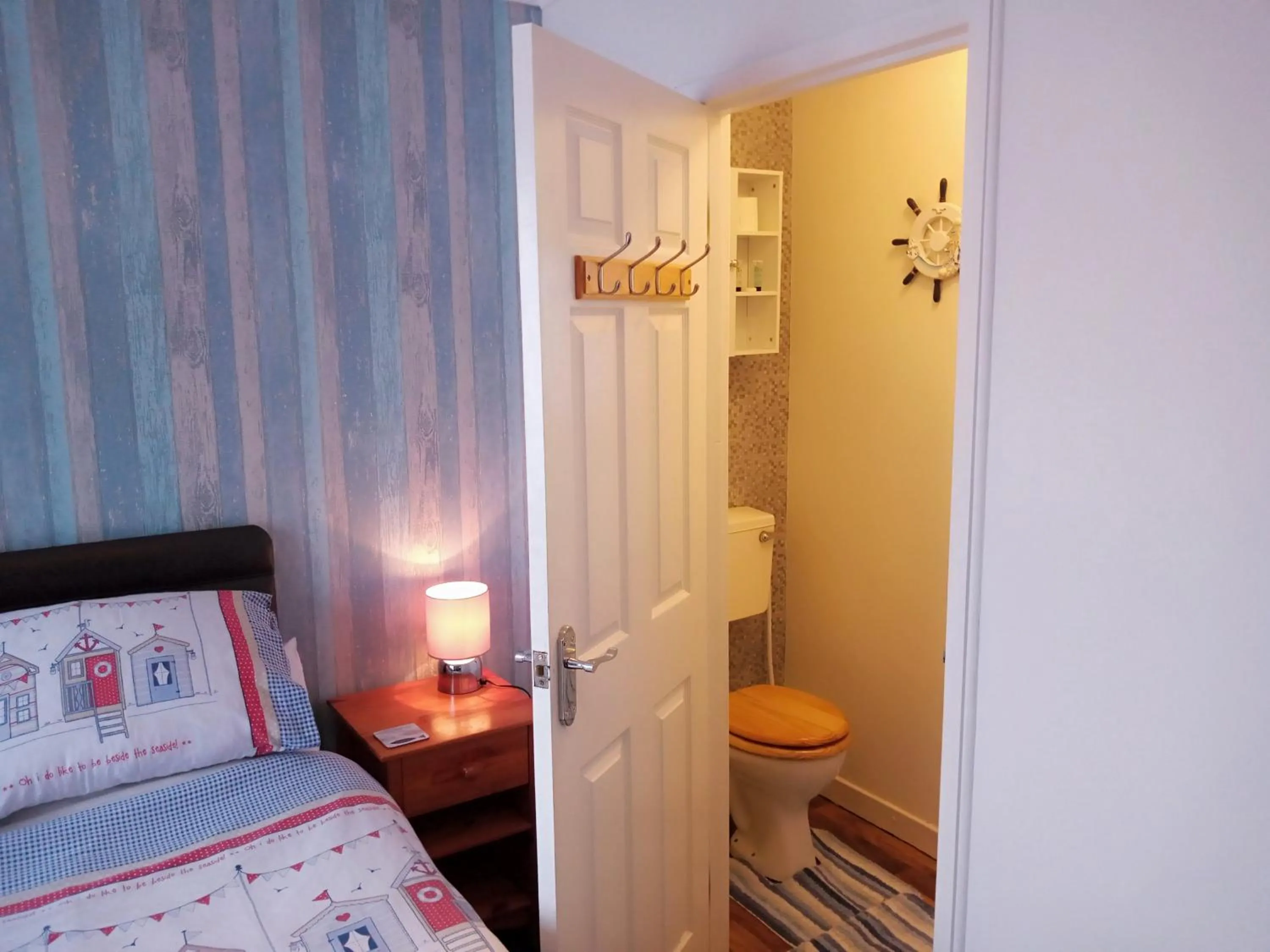Bathroom, Bed in Sandcastles Guest House