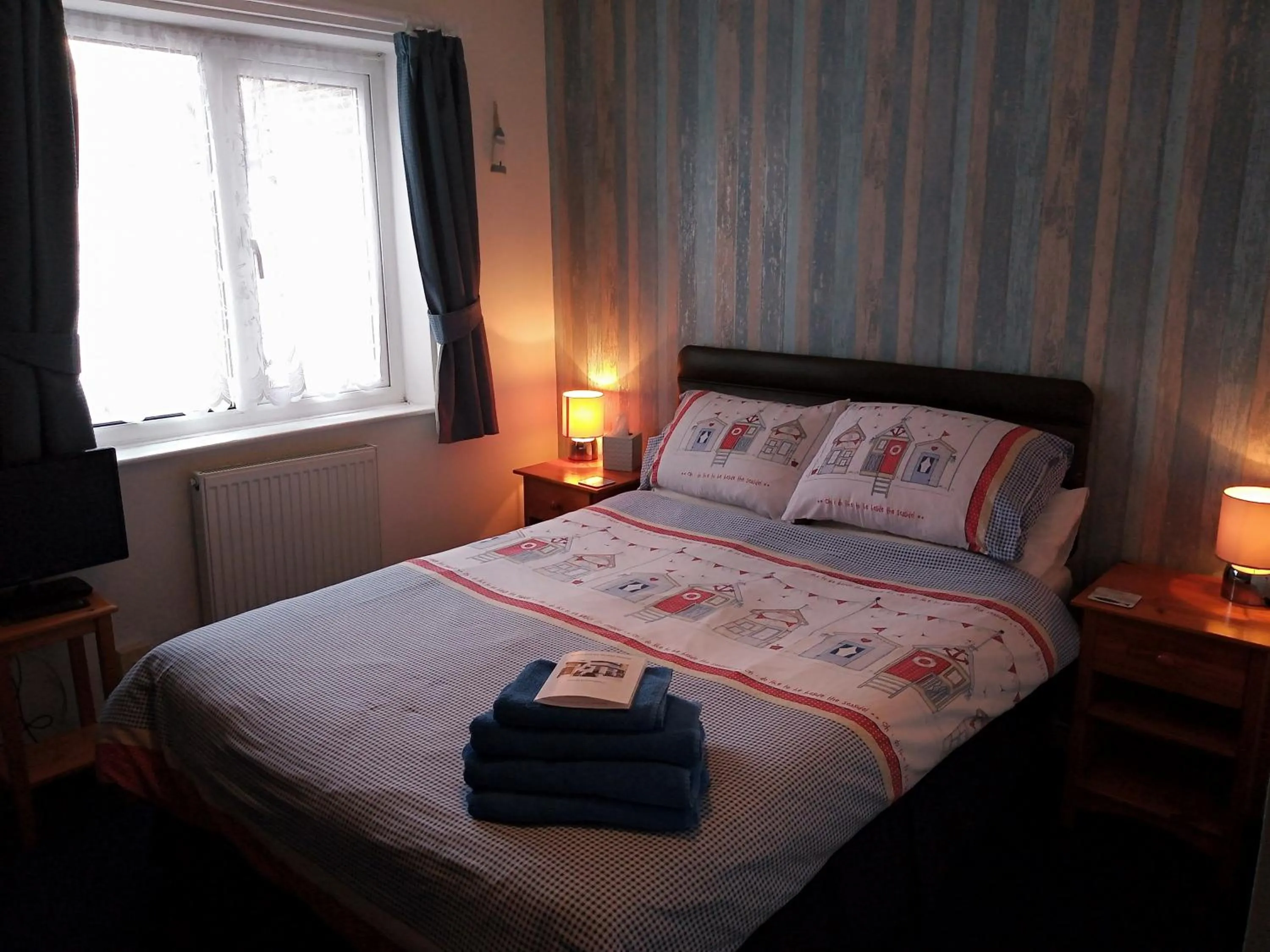 Bed in Sandcastles Guest House