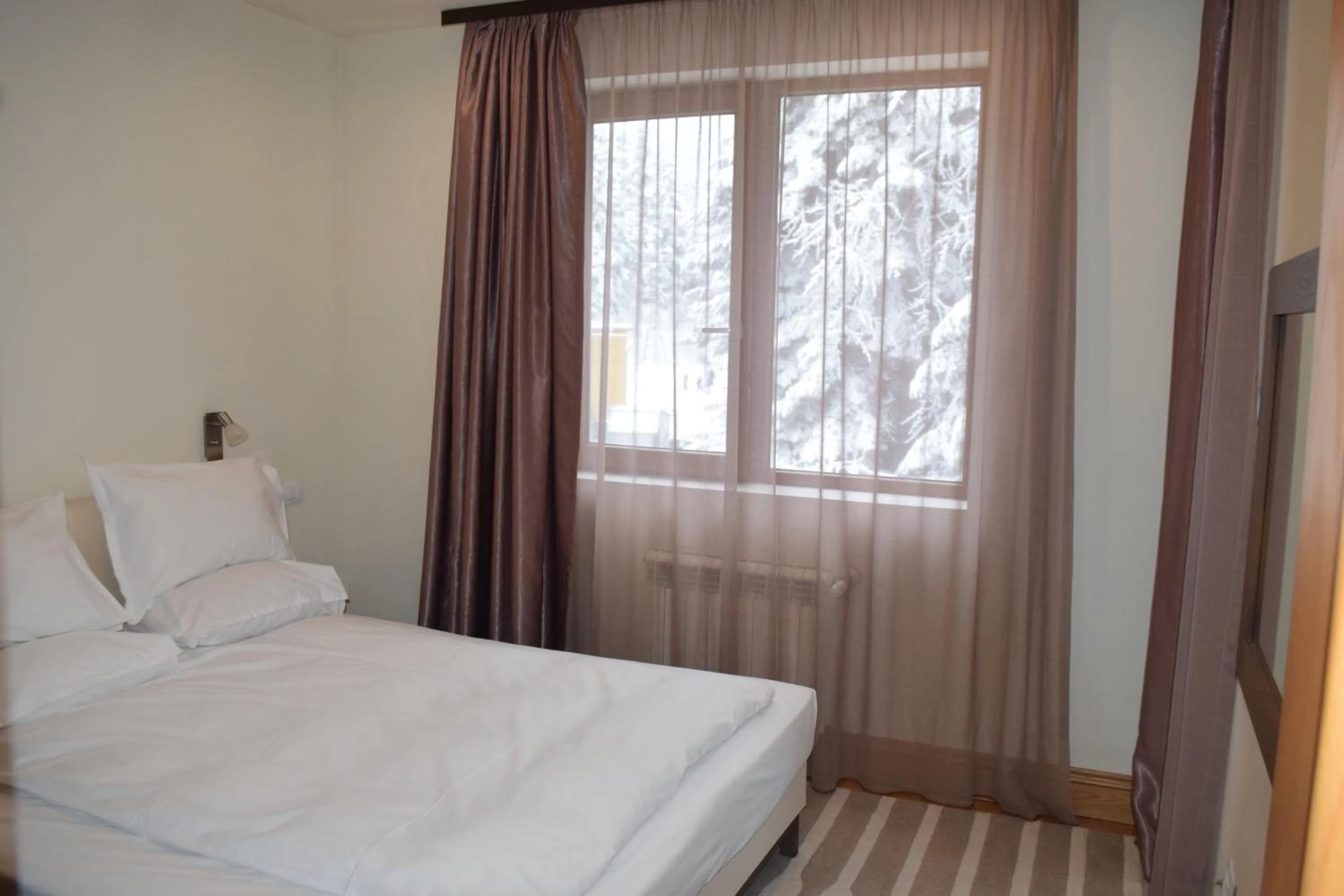 Bed in The Lodge Hotel