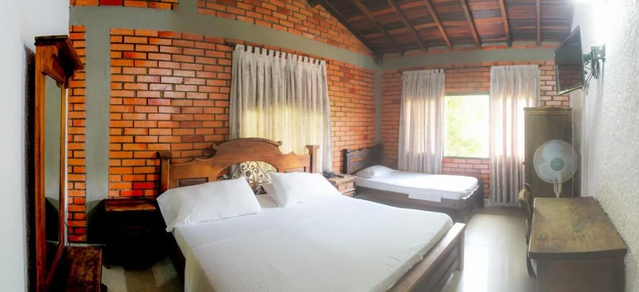 Photo of the whole room, Bed in Hotel Campestre UMPALÁ