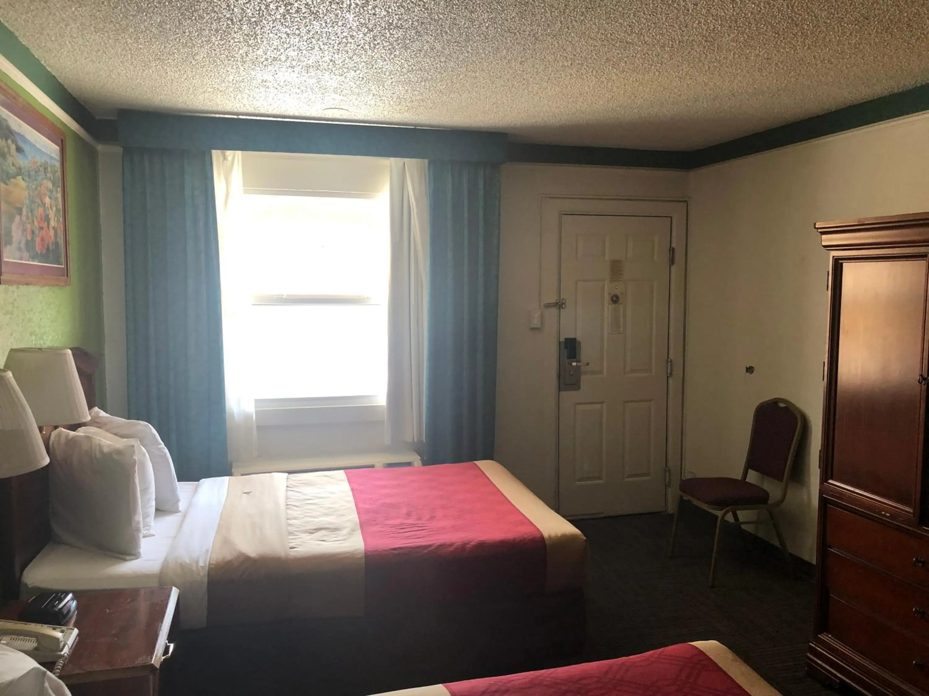 Bedroom, Bed in Americas Best Value Inn Denver