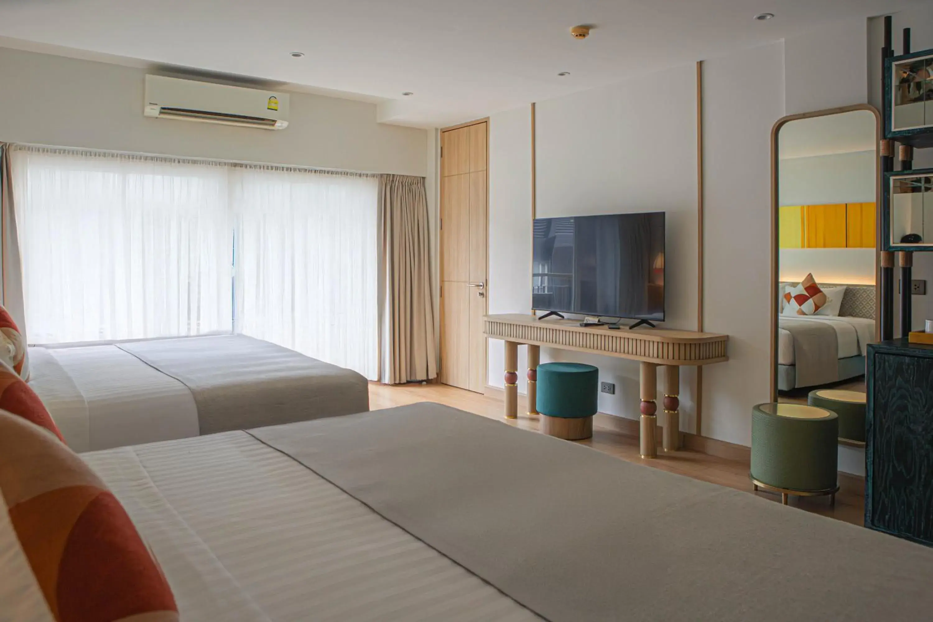 Communal lounge/ TV room, Bed in The Lantern Resorts Patong Communal lounge/ TV room, Bed in The Lantern Resorts Patong