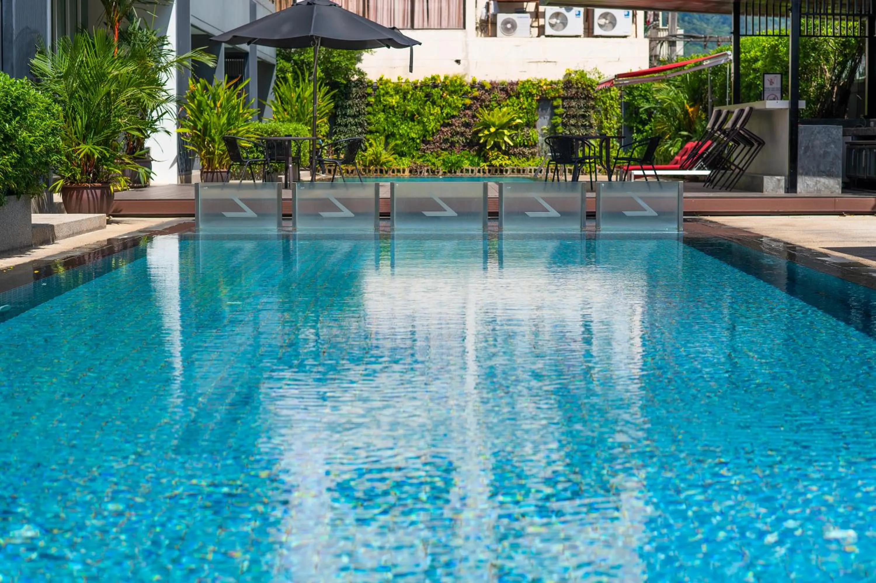 Swimming pool in The Lantern Resorts Patong - SHA Extra Plus