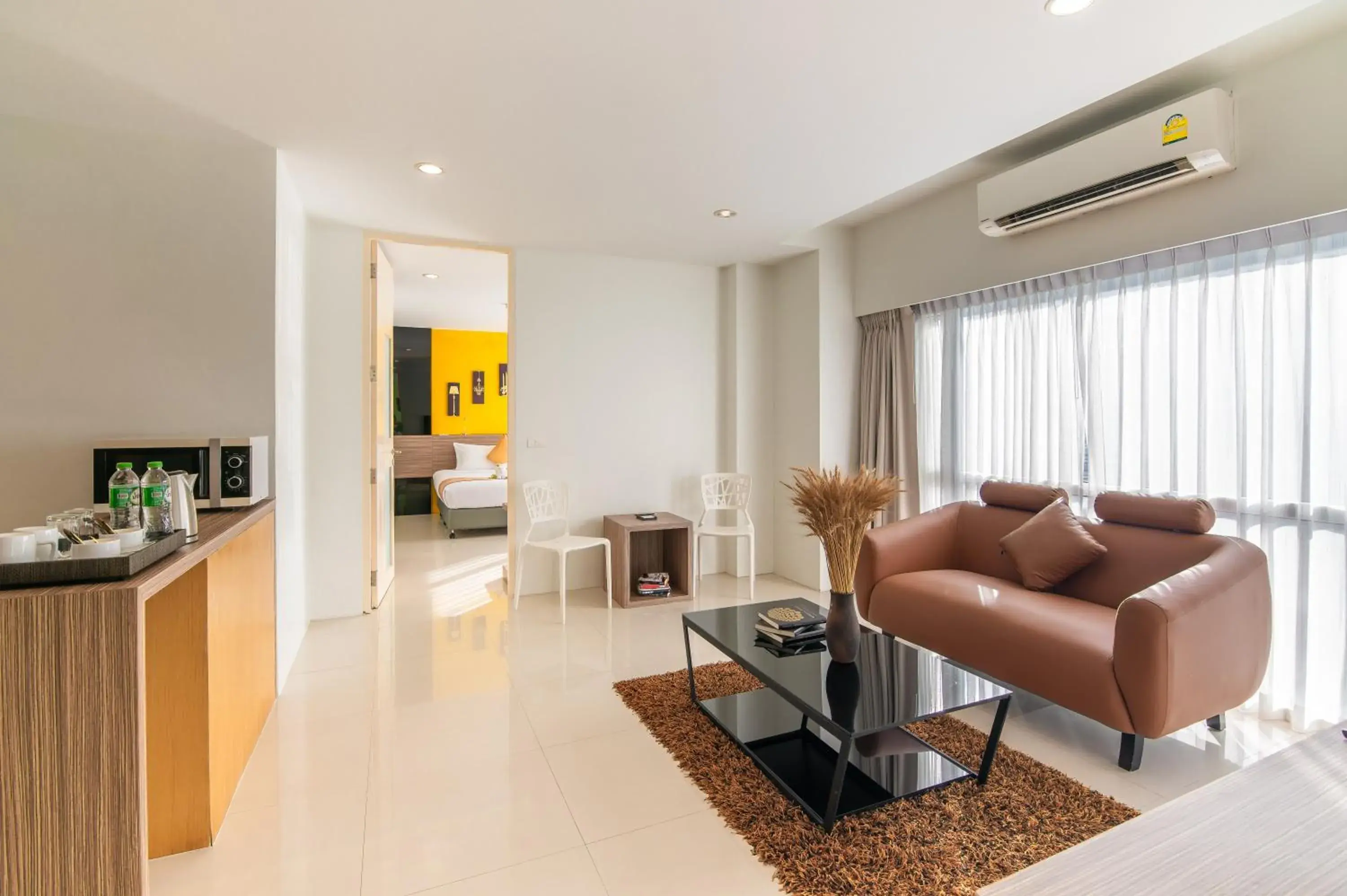 Living room in The Lantern Resorts Patong - SHA Extra Plus Living room in The Lantern Resorts Patong - SHA Extra Plus