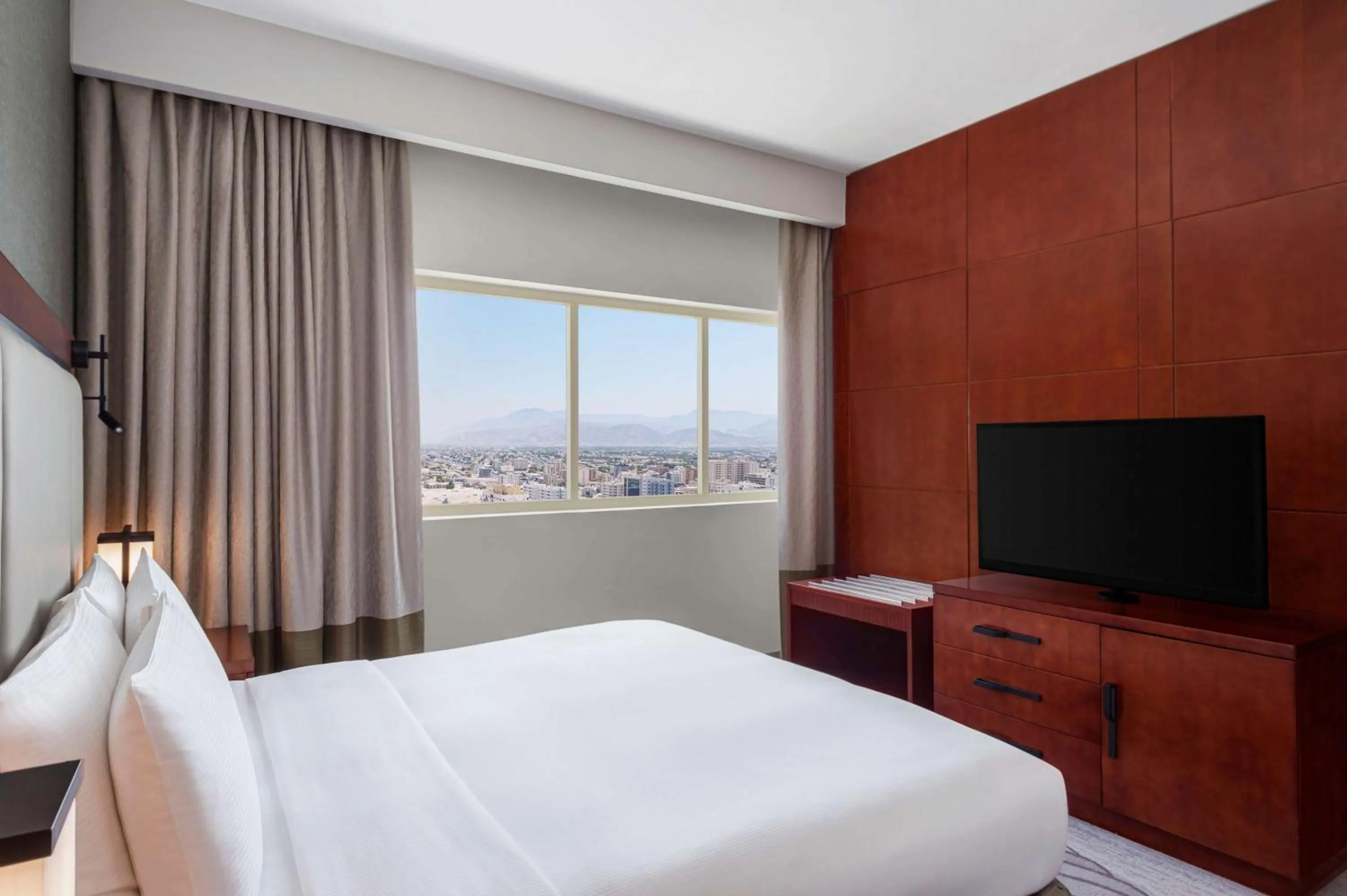 Bed, Mountain View in DoubleTree By Hilton Ras Al Khaimah