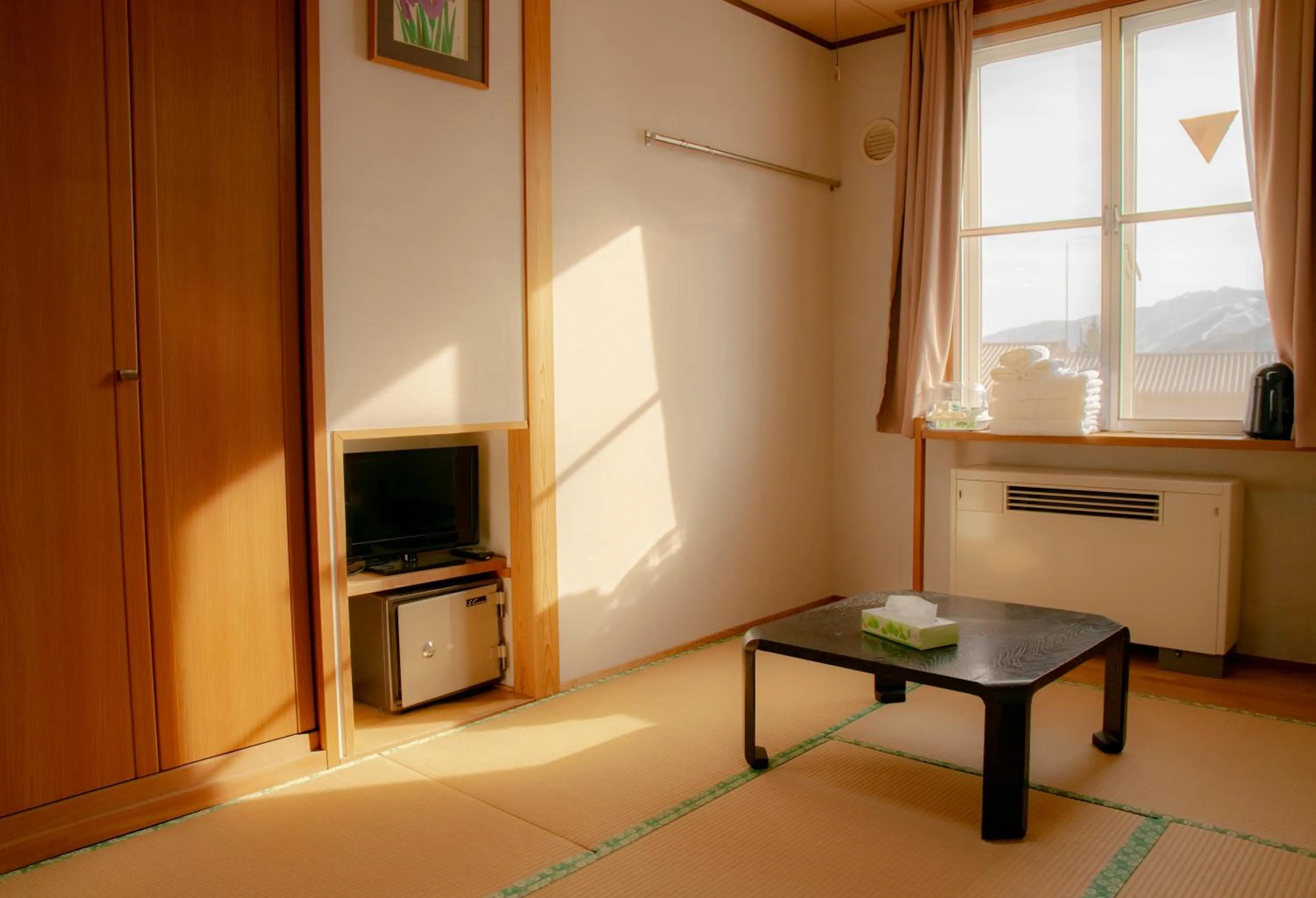 Triple Room with Mountain View in La Vista Hotel Tsugaike - Stay on the Slopes