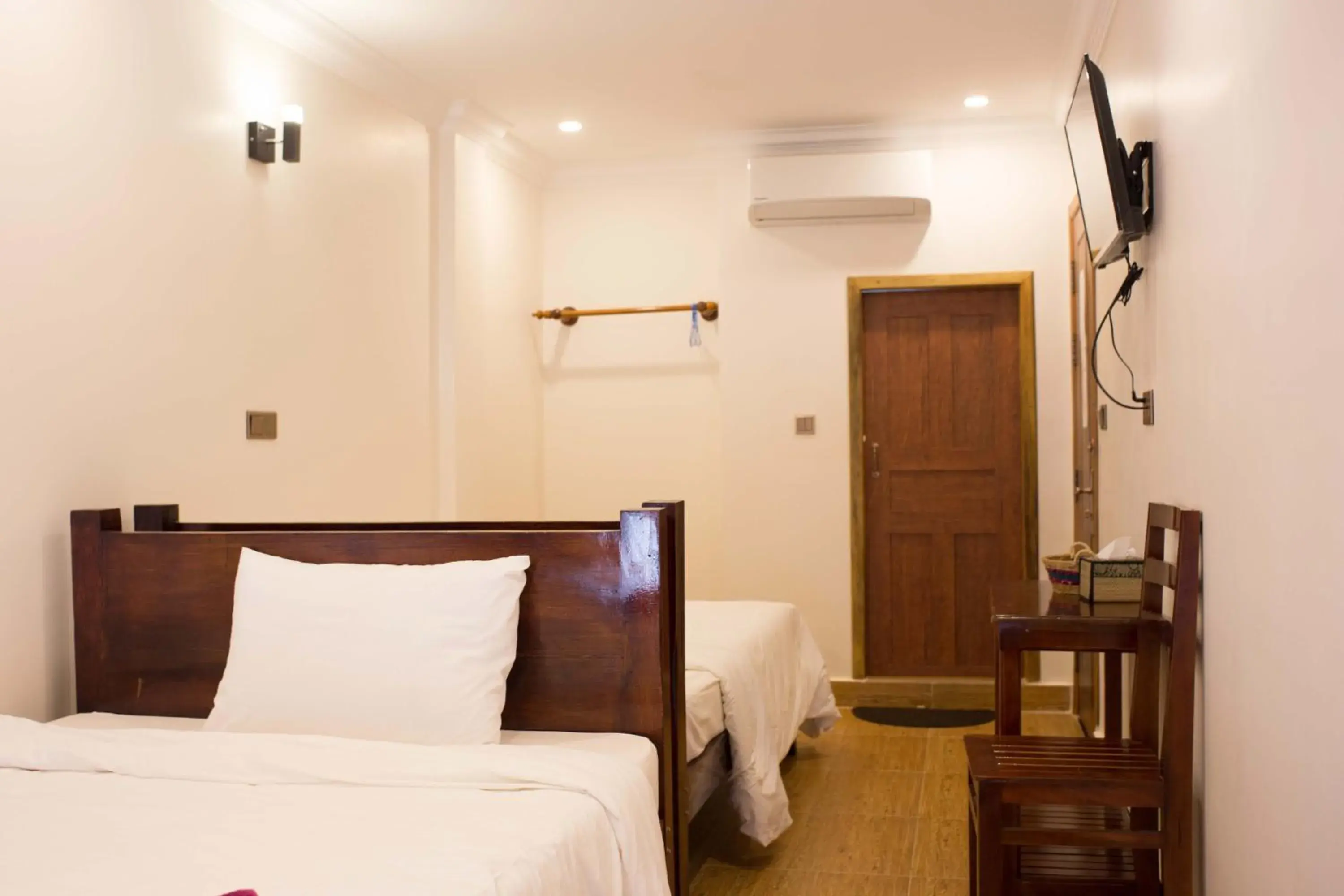 Bed in TWIN HOME Guesthouse Bed in TWIN HOME Guesthouse