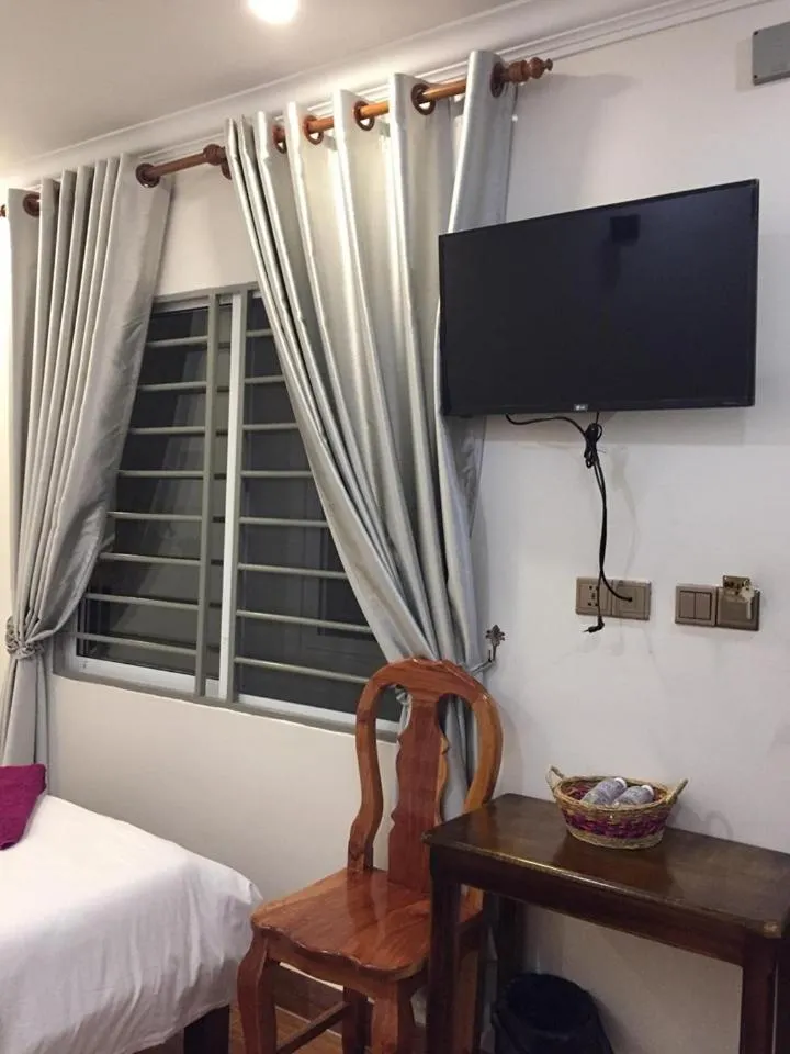 Bed in TWIN HOME Guesthouse